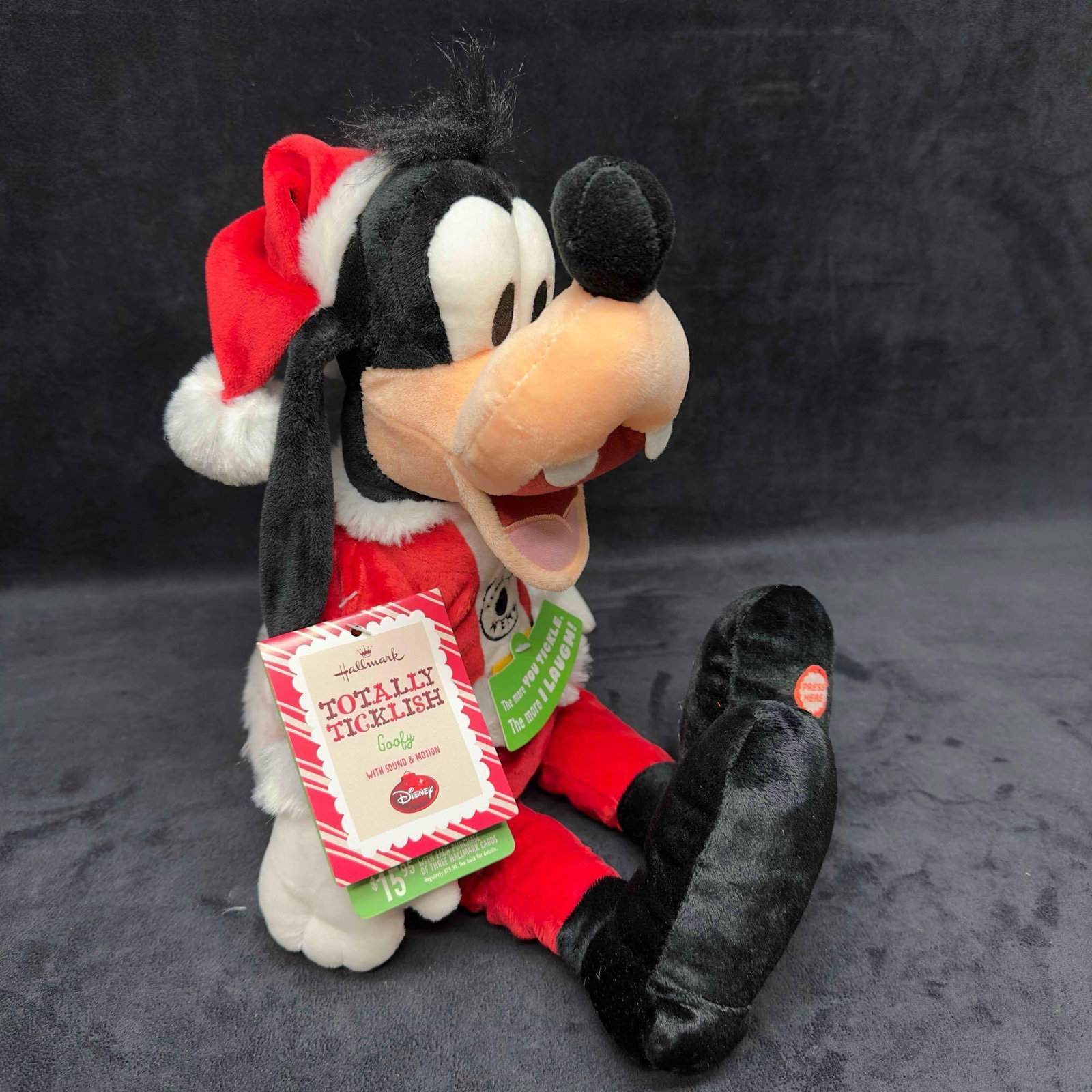 Disney Hallmark Totally Ticklish Santa Goofy Plush Sound Sings Laughs Motion: Disney Hallmark Totally Ticklish Santa Goofy Plush Sound Sings Laughs Motion. Fully functional, sound and motion working with three (3) AA batteries included. Original tags still intact. This item is