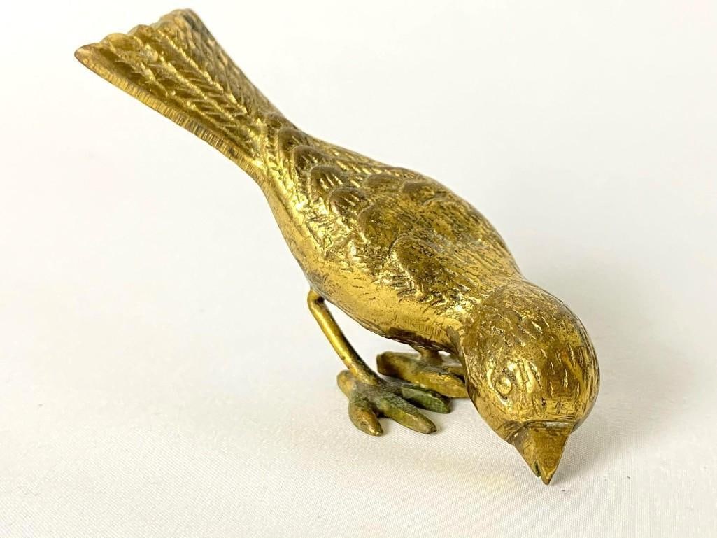 Vintage Solid Brass Feeding Finch Bird Figurine: Vintage Solid Brass Feeding Finch Bird Figurine. This is approx 3" x 2" x 2 3/4" and it weighs 0.49lb. Is marked "Made In Hong Kong" on the bottom of the bird's foot. The figurine has some signs of
