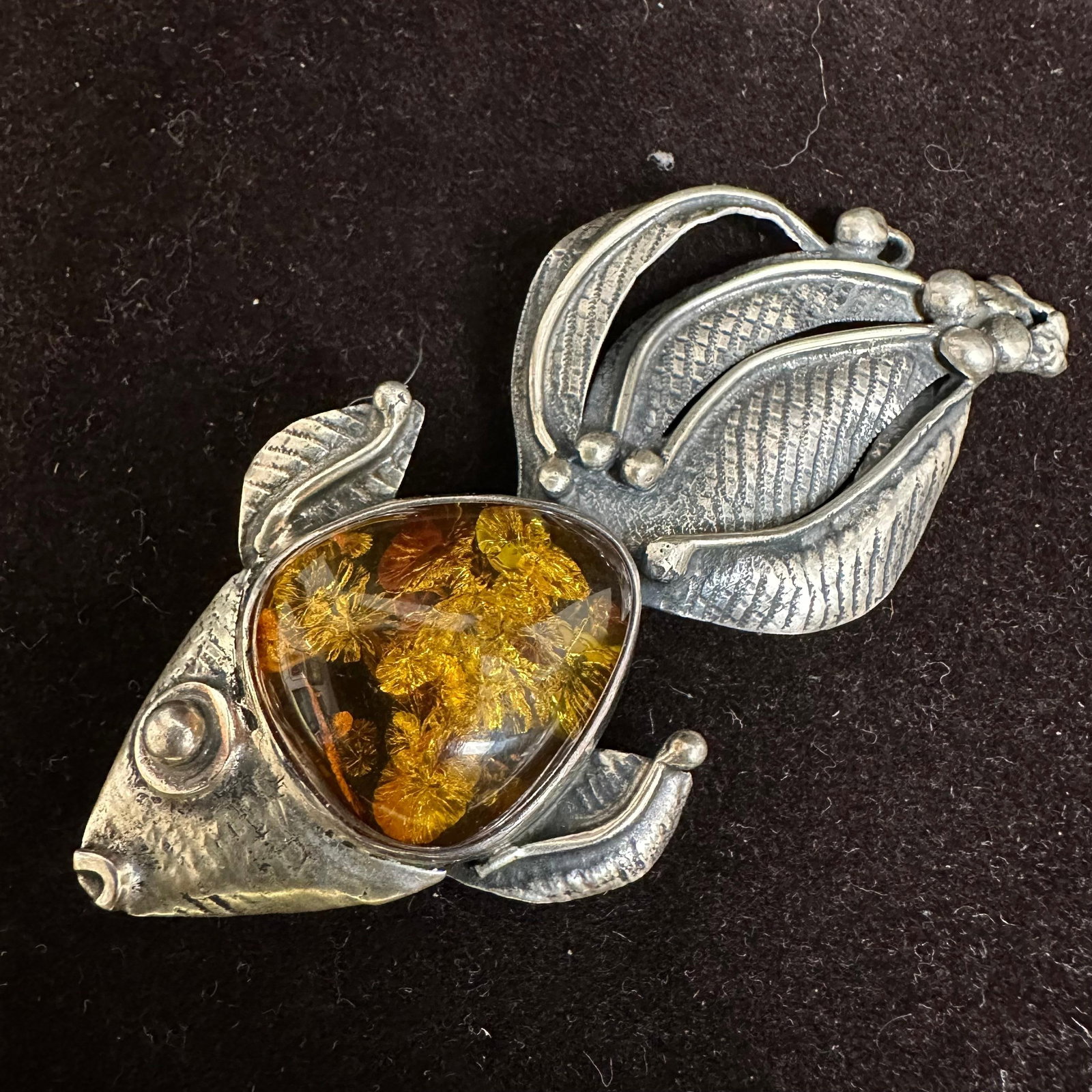 Baltic Amber Fish Silver Brooch: This item is in good pre-owned, previously used/displayed condition with noticeable light wear and surface scratches. Please reference all photos for full details. This piece of jewelry has been