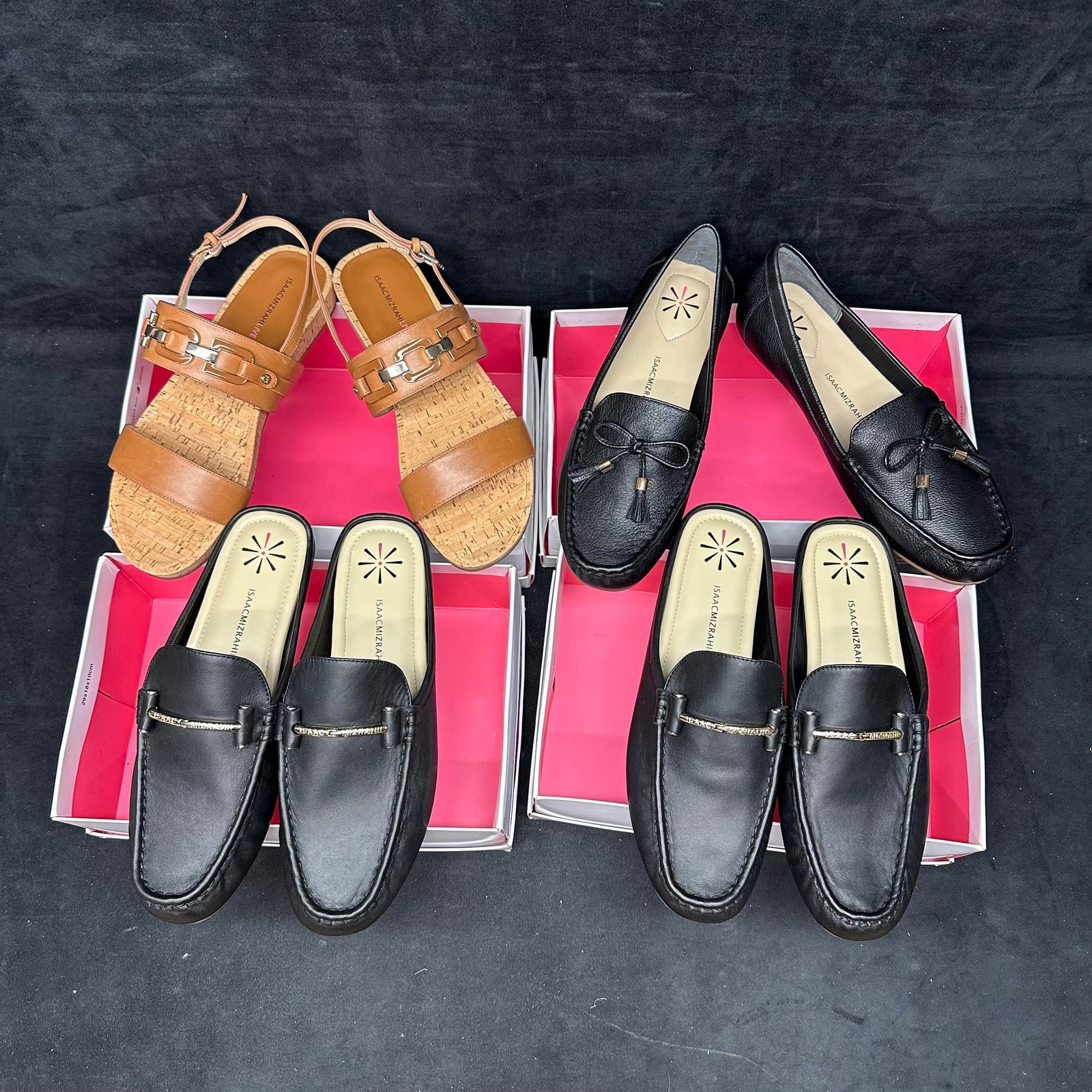 Isaac Mizrahi Live Women's Shoes Four Pair Lot Loafer and Sandal Style: Set of four pairs of Isaac Mizrahi Live women’s shoes. Includes styles and sizes as follows: two pairs of “Abbie” black leather loafers 9.5M, one pair of “Tatum” light