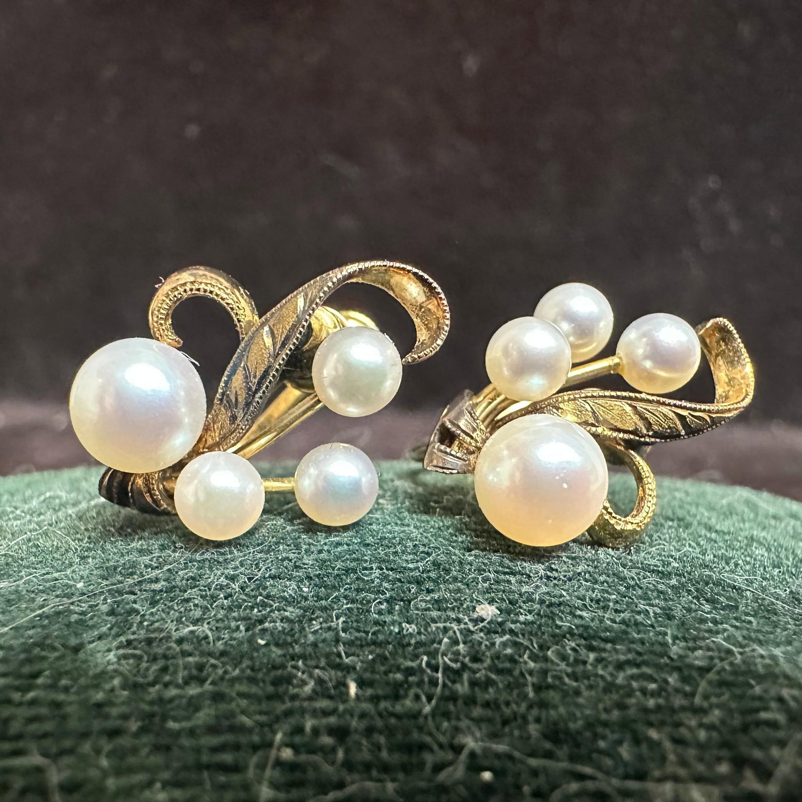 Mikimoto Pearls 14K Gold Four Pearl Accent Screw-Back Earrings: This item is in good pre-owned, previously used/displayed condition with noticeable light wear and surface scratches. Please reference all photos for full details. This piece of jewelry has been