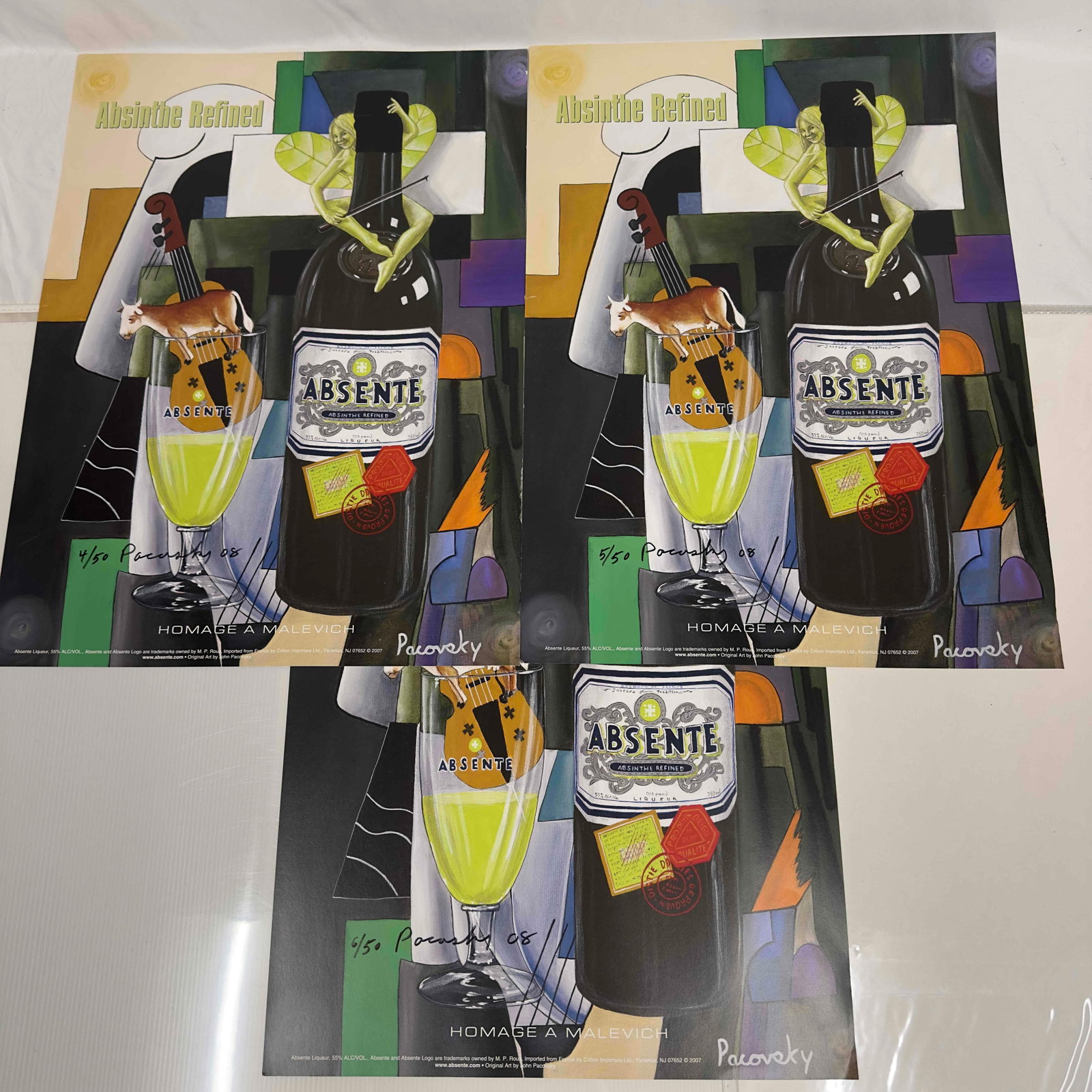 Absinthe Refined Ad Poster Homage A Malevich by John Pacovsky Hand Signed and Numbered: Absinthe Refined Ad Poster Homage A Malevich by John Pacovsky Hand Signed and Numbered. This set includes three (3) hand signed and numbered posters by John Pacovsky. Limited Edition 50, from 2008. A 