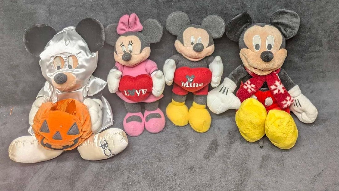 Disney Mickey And Minnie Mouse Holiday Plushes Lot Of 4: Disney Mickey And Minnie Mouse Holiday Plushes Lot Of 4. This lot includes: (1) Mickey Mouse Plush Ghost With Pumpkin.This is approx 10 3/4" x 11" x 5". Has some markings on the costu