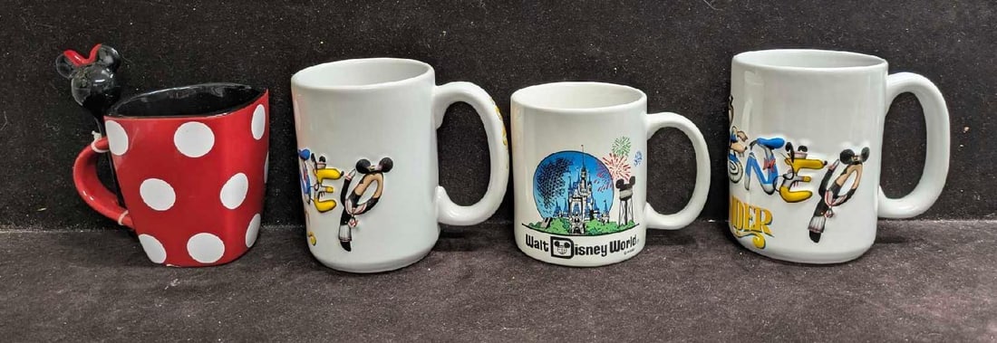 Disney Cruise Line Minnie Mouse And Disney World Mugs: Disney Cruise Line Minnie Mouse And Disney World Mugs. This lot contains: (1) Disney Magic (Cruise Line) Mug. This is approx 4 5/8" x 5" x 4". (1) Disney Wonder (Cruise Line) Mug.