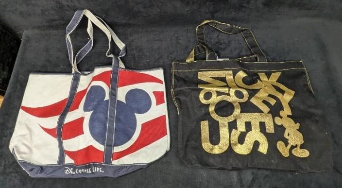 Disney Cruise Line And Mickey Mouse Tote Bags: Disney Cruise Line And Mickey Mouse Tote Bags. This lot includes: (1) Disney Cruise Line Tote Bag. This is approx 20" x 2" x 14". (1) Disney Mickey Mouse Black Tote Bag. This is approx 18&