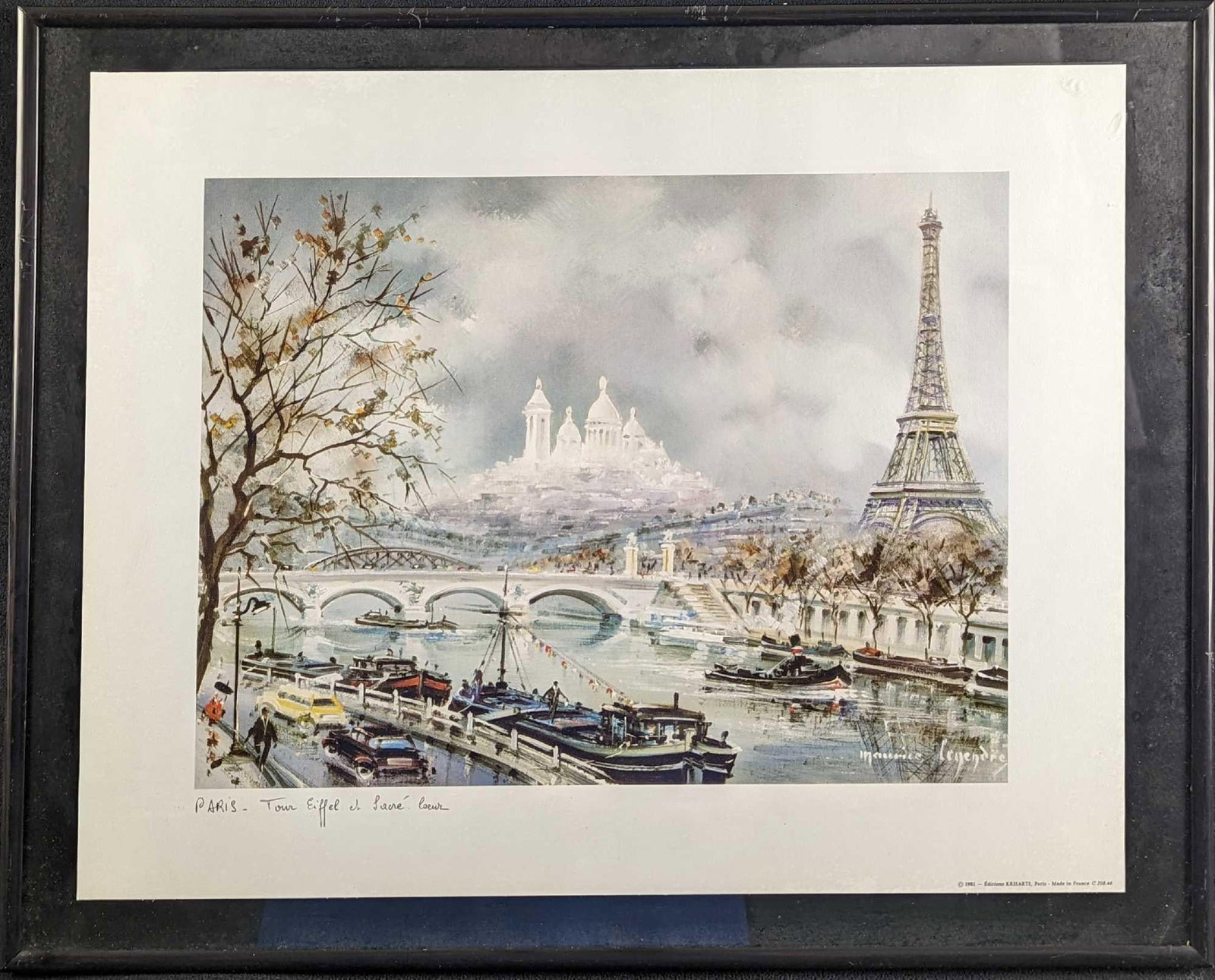 Framed Maurice Legendre Eiffel Tower Print: Framed Maurice Legendre Eiffel Tower Print. The framed print is approx 20 3/8" x 3/4" x 16 1/2" and it weighs 4.5lbs. The print is approx 17 1/2" x 14". The framed print is in a good,