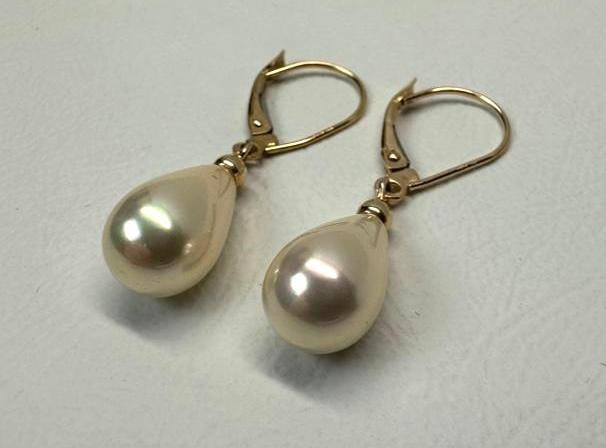 14k Gold Simulated Pearl Earrings: This piece of jewelry has been tested and researched prior to listing. Please view all our pictures they are part of our description. DETAILS: Metal - 14k Gold Color - Yellow Gold Stones - simulated&#