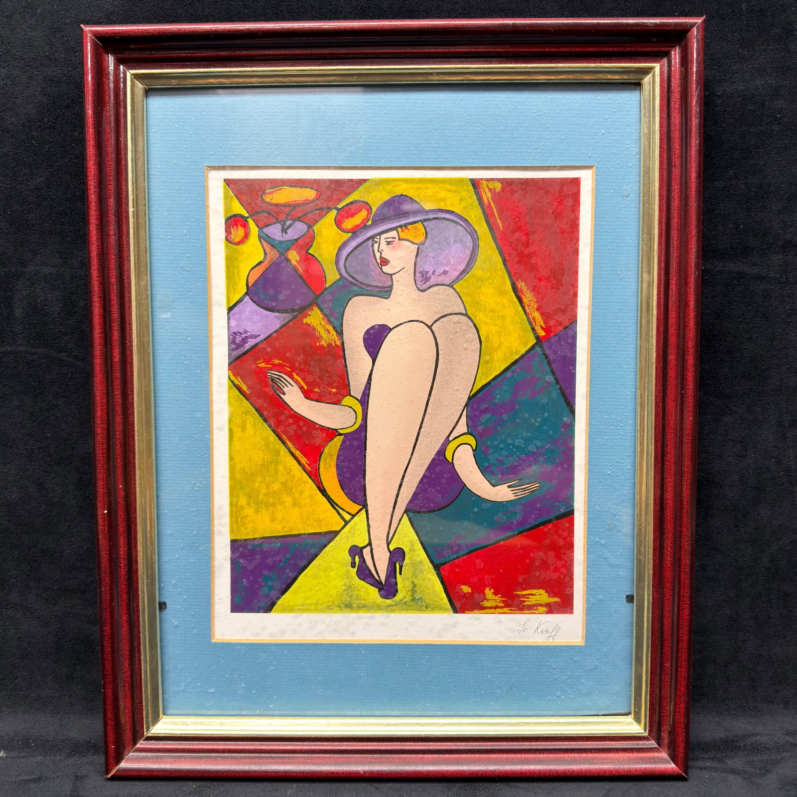 Signed Linda Le Kinff Framed Figural Art Print of Seated Woman R240: Framed decorative art print after French artist Linda Le Kinff, featuring a colorful geometric composition with a seated female figure in a purple hat. The print bears a Le Kinff signature in the lowe