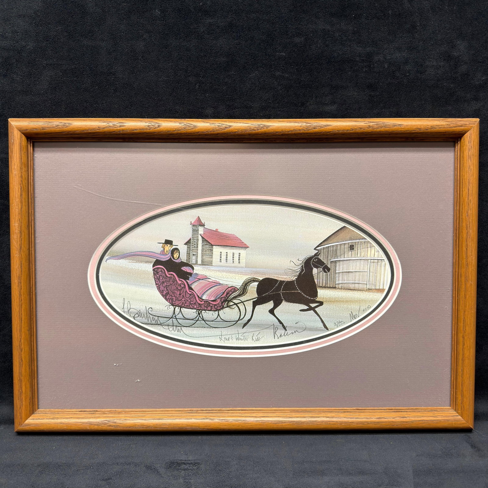P. Buckley Moss Loves Winter Ride Signed and Numbered Framed Print Purple Matte: Limited edition art print by acclaimed American folk artist Patricia Buckley Moss. This print is hand-signed by the artist, numbered 972/3000, and dated 1995. This item is in good pre-owned, previousl