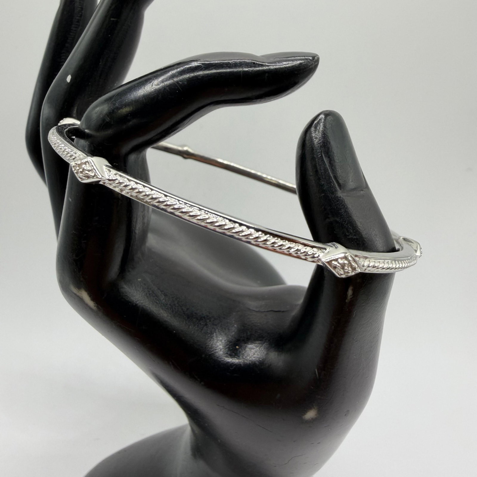 Affinity Diamonds Sterling Silver Moissanite Bangle Bracelet ER9: This item is in pre-owned, previously used/displayed condition with noticeable light wear and surface scratches. Please reference all photos for full details. This piece of jewelry has been carefully