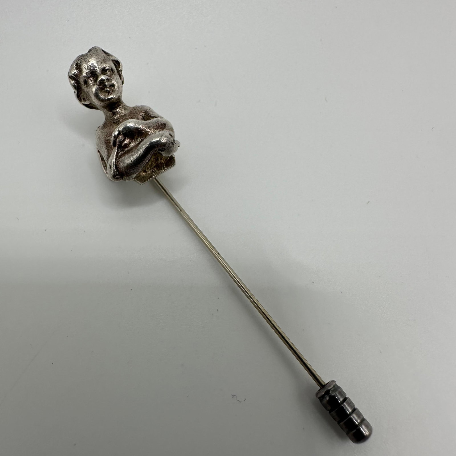 Gorham Sterling Silver Cherub Angel Lapel Hat Pin: This item is in good pre-owned, previously used/displayed condition with noticeable light wear and surface scratches. Please reference all photos for full details. This piece of jewelry has been teste