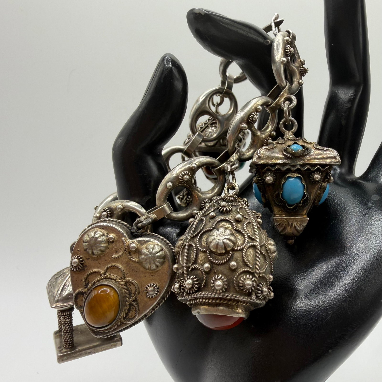 Natural and Faux Stone Ornate Charms 800 Silver Etruscan Style Bracelet ER26: This item is in pre-owned, previously used/displayed condition with noticeable light wear and surface scratches. Please reference all photos for full details. This piece of jewelry has been carefully 