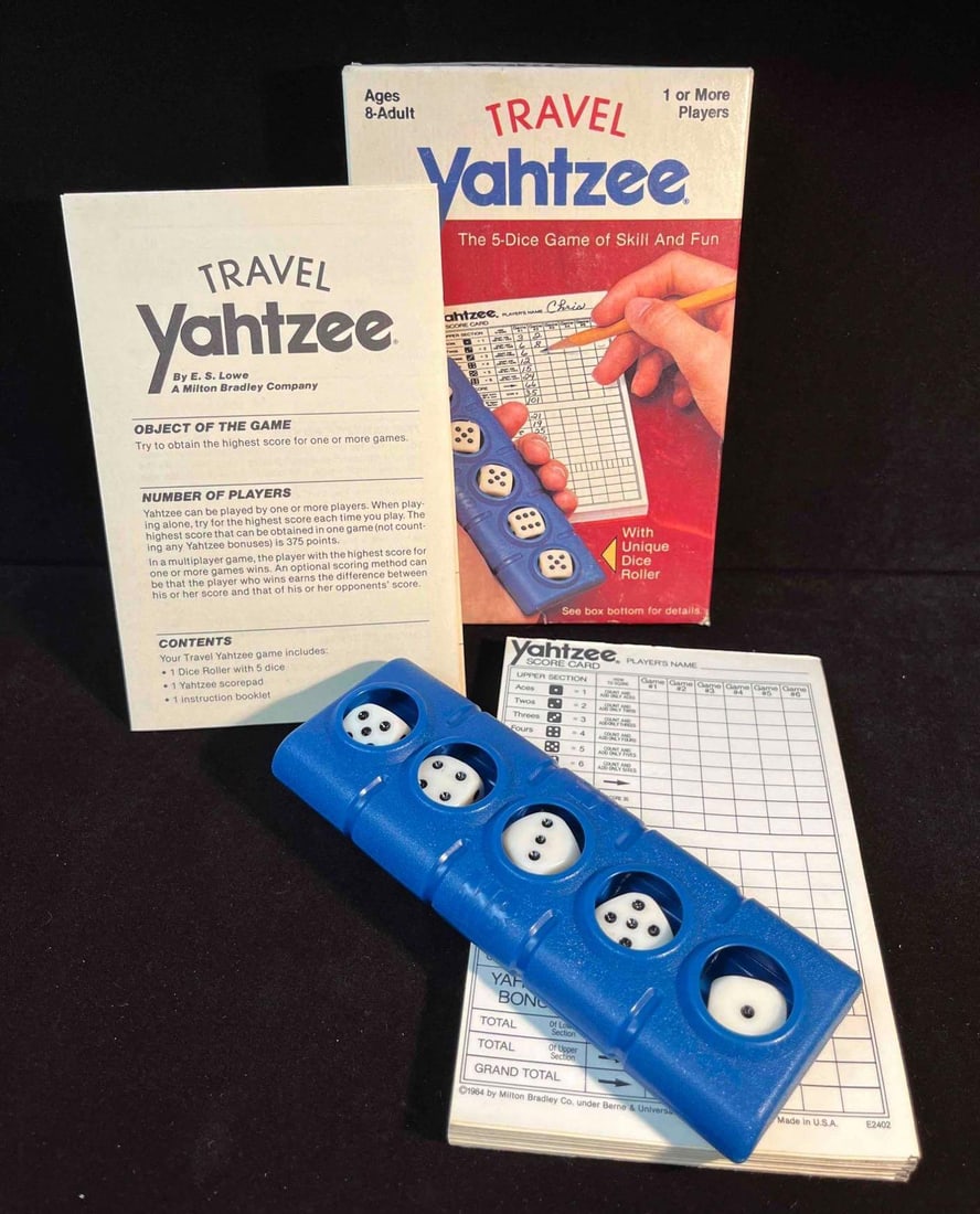 1984 Vintage Travel Yahtzee Game Milton Bradley Co.: This lot contains a 1984 Vintage Travel Yahtzee Game Milton Bradley Co. It is approx 6 1/4" x 4 1/4" x 1 1/4" and it weighs about 0.4lbs. Overall the Vintage game is in good used condition w