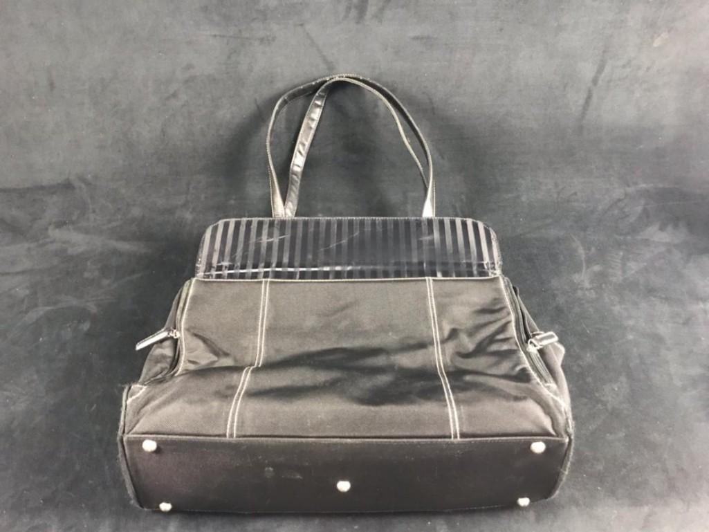 Codi Laptop Black Travel Briefcase: Laptop Black Travel Briefcase By Codi. Has five large compartments. Is approx 16" x 12". Is approx 16" x 23" counting straps. Briefcase is in good. used condition with some wearing and a slight smokey