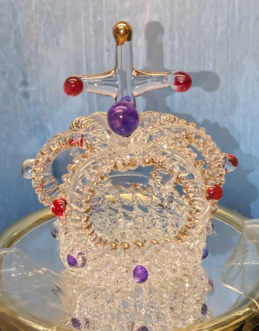 Glassical Expressions Glass Crown With 22KT Gold Music Box: Glassical Expressions Glass Crown With 22KT Gold Music Box. This was sealed in the original packaging which is approx 8"x 5" x 5" and it weighs 0.79lb. The bottom says the music played is "Sleeping Be