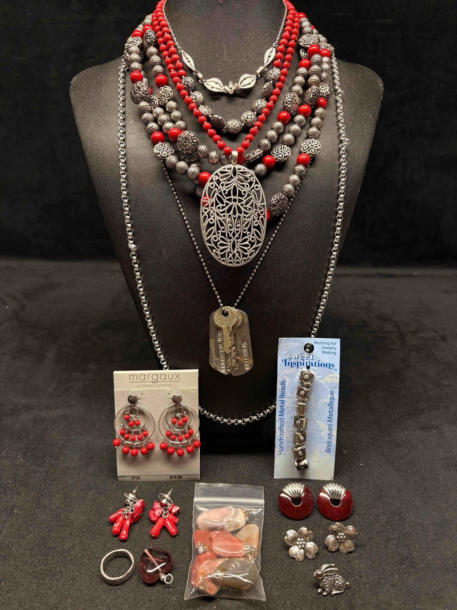 14pc Red and Silver Toned Cinnabar and Steel Costume Jewelry Collection: This lot contains 14 pieces of pre-owned costume jewelry, paired together in a stylized set. Each piece is in good conditions, with wear and tear over the years visible on some of the jewelry. Please
