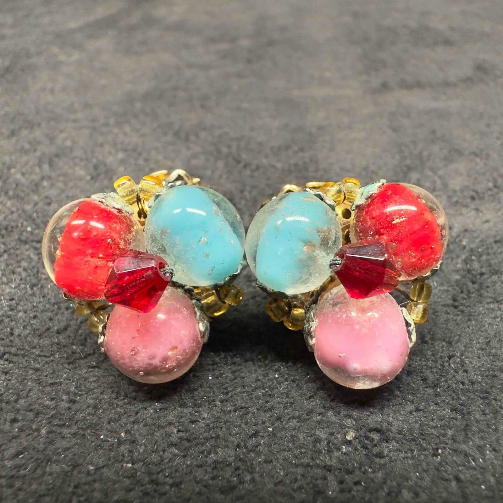 Murano Venetian Art Glass Lamp Work Red Pink Light Blue Round Copper Beaded Earrings D33: Murano Venetian Art Glass Lamp Work Red Pink Light Blue Round Copper Beaded Earrings D33. Earrings with red, light blue, and pink colored glass beads with beautiful designs on each. The earrings featu
