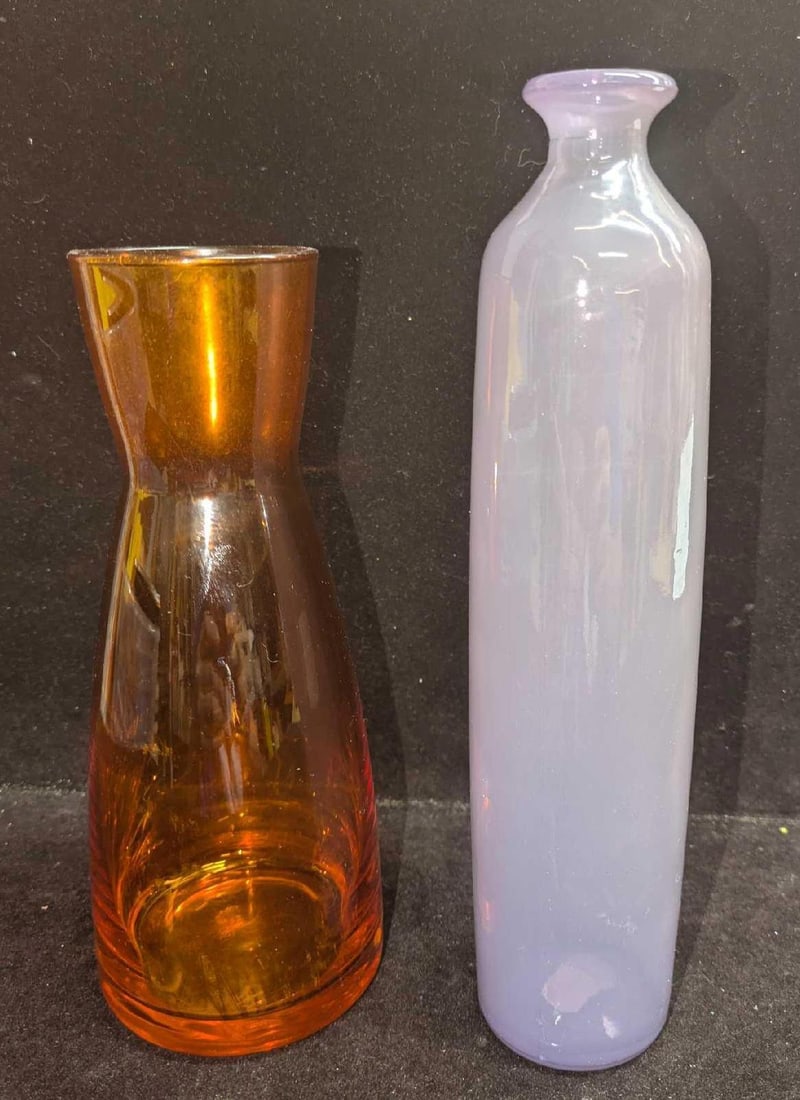 2 Vintage Glass Serving Carafe Vases: 2 Vintage Glass Serving Carafe Vases. This lot includes: (1) Glass Serving Carafe/Vase. This is approx 3 1/4" x 3 1/4" x 8". This has some scratches and scuffs. (1) Made in Spain Vase. Thi