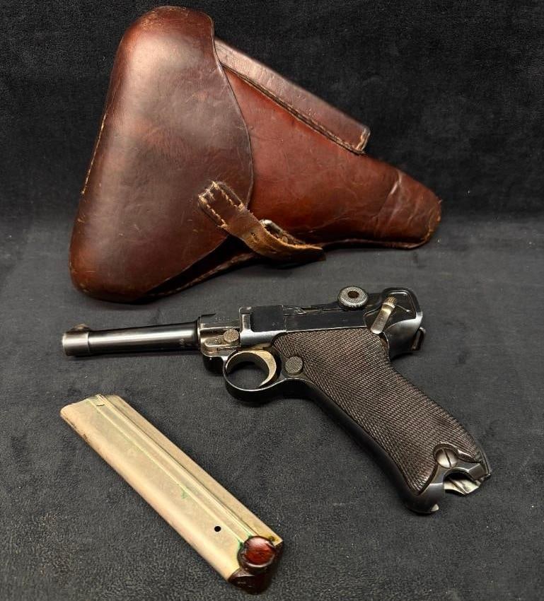1914 DWM P.08 Luger w/ 1916 Holster: 1914 DWM P.08 Luger w/ 1916 Holster This lot includes a German DWM Model 1908 (P.08) Luger semi-automatic pistol chambered in 9mm Parabellum. The chamber is dated 1914 and the pistol bears Imperial Ge