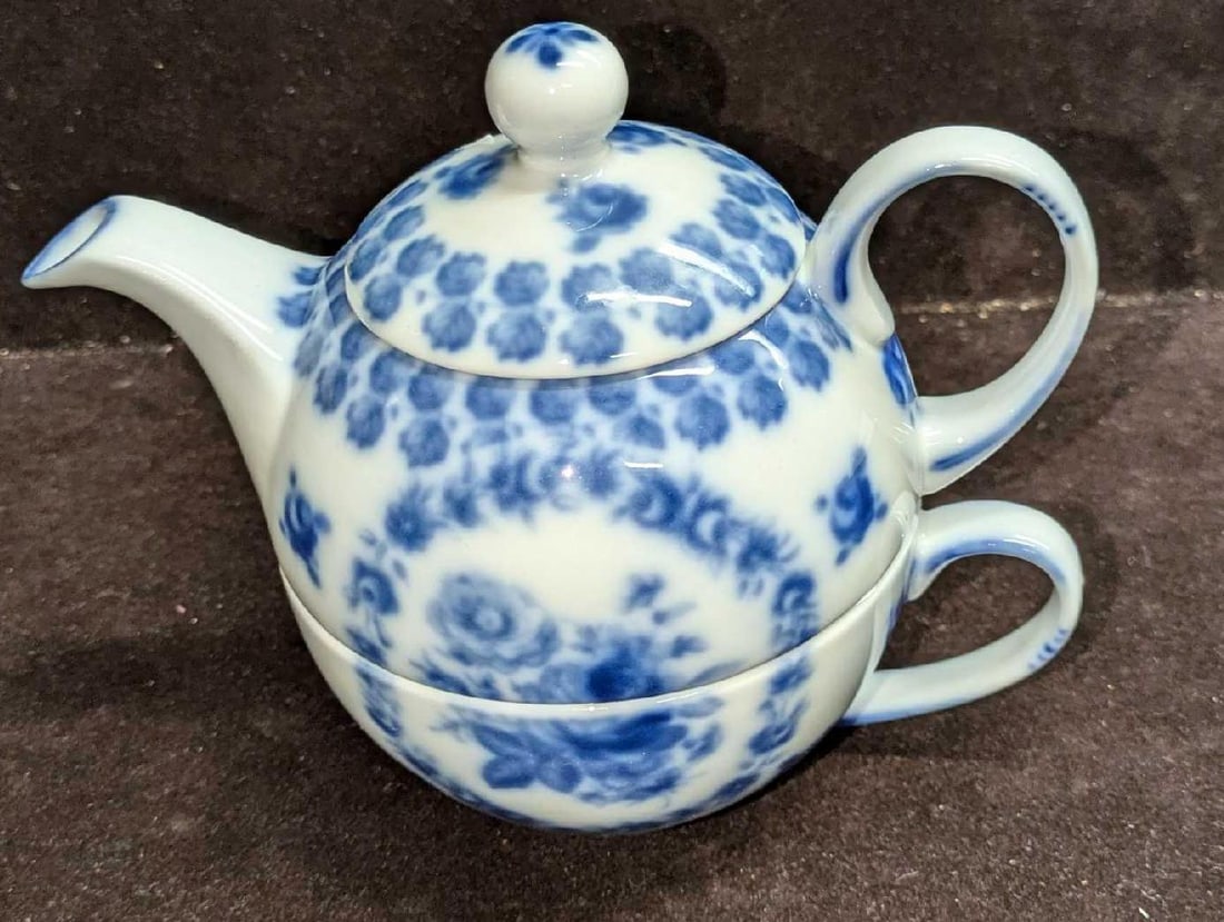 Vintage Royal Crown Derby Teapot With Cup: Vintage Royal Crown Derby Teapot With Cup. This is can porcelain mini teapot and cup. The cup is approx 5" x 4" x 2 1/8". The teapot and top is approx 6 1/2" x 4 1/4" x 5". The total weight 