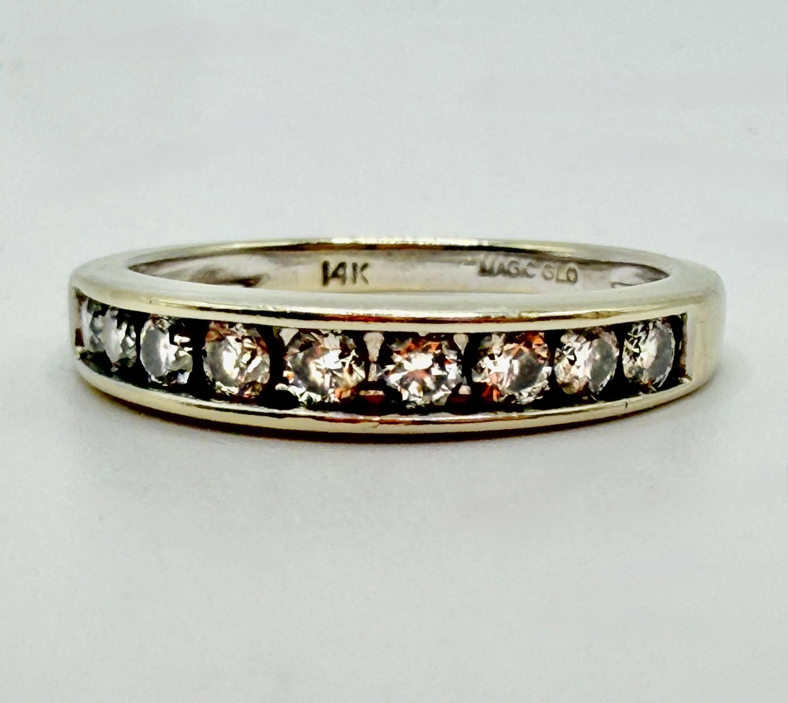 14K White Gold Diamond Wedding Anniversary Band Ring Magic Glo Nine Diamonds: This item is in good pre-owned, previously used/displayed condition with noticeable light wear and surface scratches. Please reference all photos for full details. This piece of jewelry has been teste