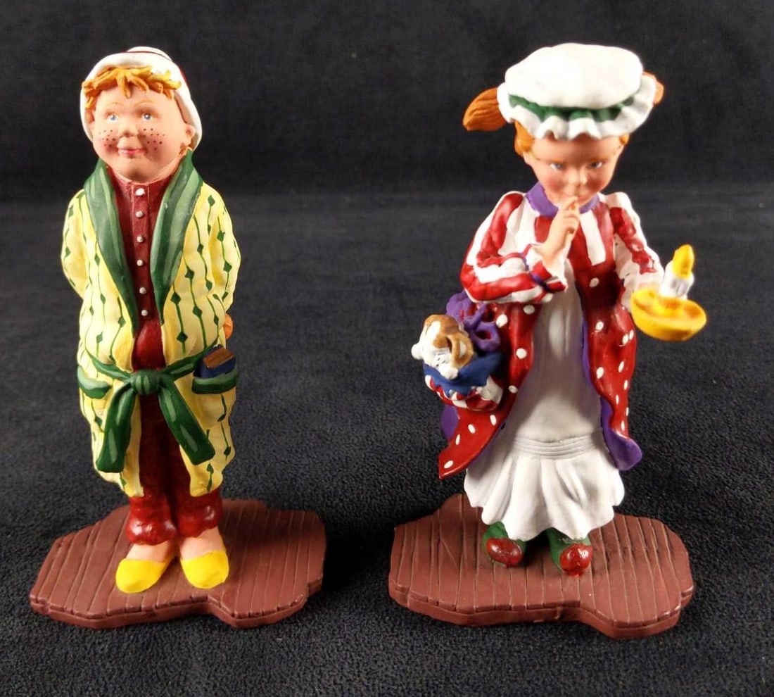 Retired All Through The House Billy Mary Jo Figures: Whimsical and brightly hand-painted, the Dept. 56 All Thru The House resin figures were retired in 1997. This lot includes both "Billy" and "Mary Joe" figures. Both come in their original boxes. Billy