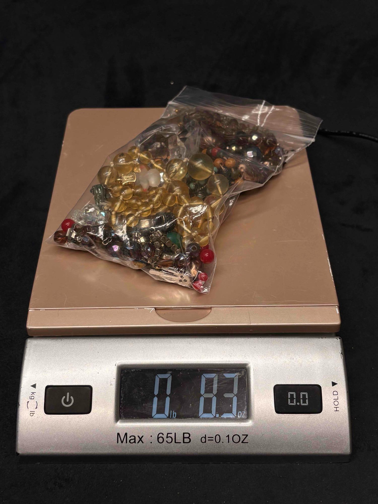 8.3 OZ of Randomly Assorted Warm Tone Beads and Charms for Crafting: This lot consists of randomly assorted beaded necklaces, earrings, and charms. These beaded jewelry can be dismantled and reused for crafting purposes. APPROX. WEIGHT: 8.3 OZ