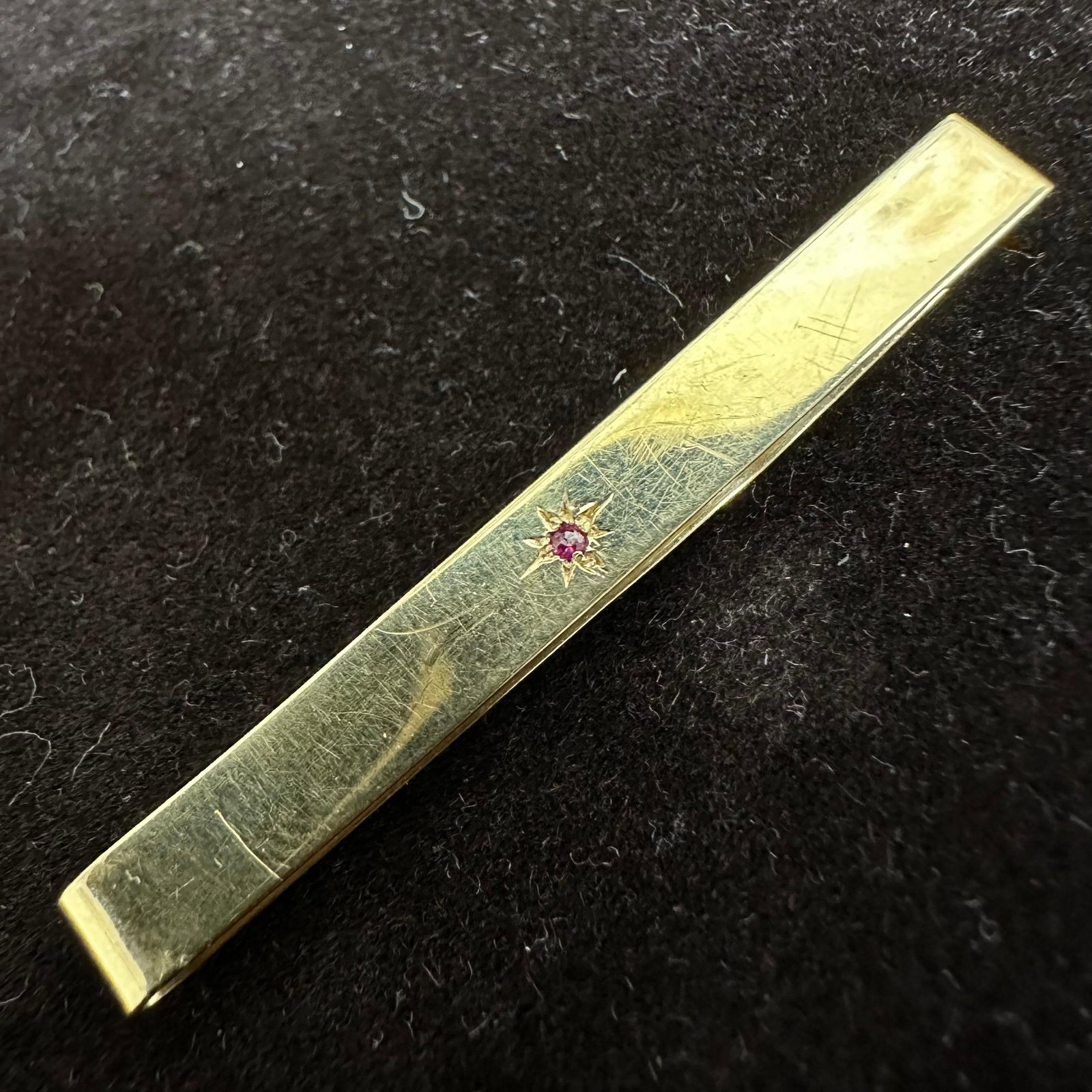 WEH 14K Yellow Gold Tie Bar Clip Sapphire Accent: This item is in good pre-owned, previously used/displayed condition with noticeable light wear and surface scratches. Please reference all photos for full details. This piece of jewelry has been teste