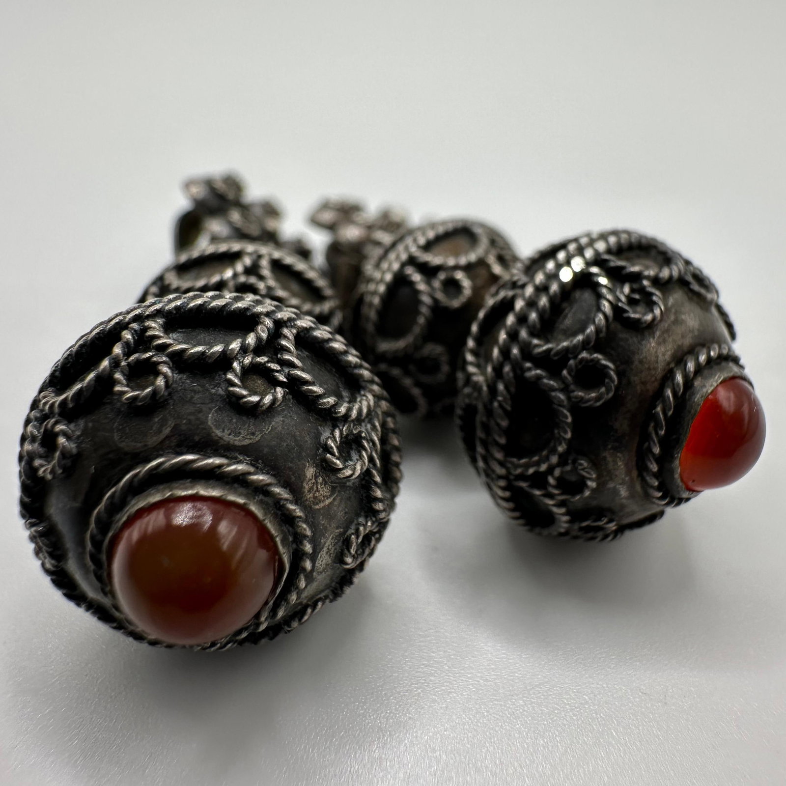 Carnelian Red Stone Cabochon 800 Silver Granulation Style Dangle Earrings: This item is in good pre-owned, previously used/displayed condition with noticeable light wear and surface scratches. Please reference all photos for full details. This piece of jewelry has been teste