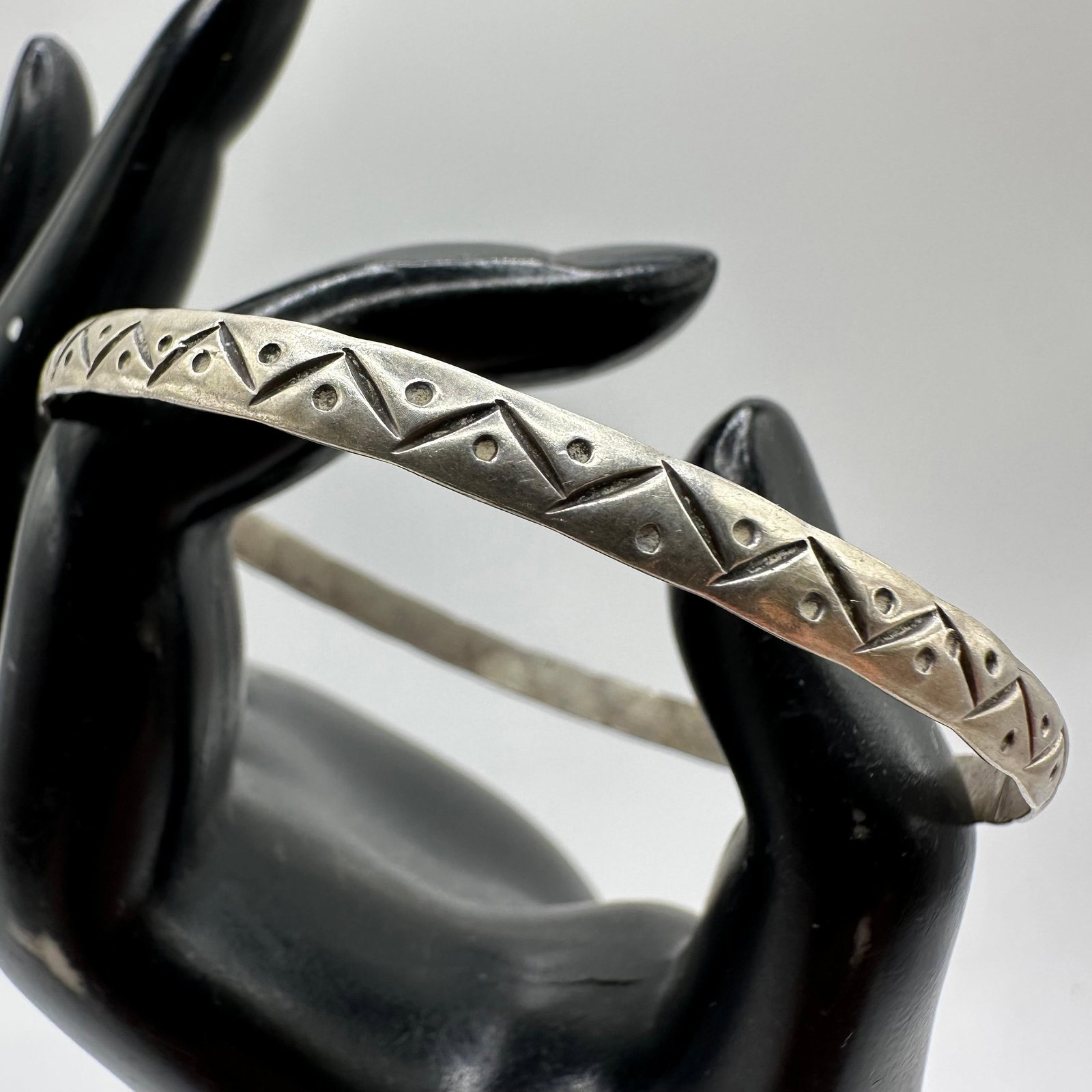 Etched Geometric Dot and Line Design Silver Bangle Bracelet M70: This item is in good pre-owned, previously used/displayed condition with noticeable light wear and surface scratches. Please reference all photos for full details. This piece of jewelry has been teste