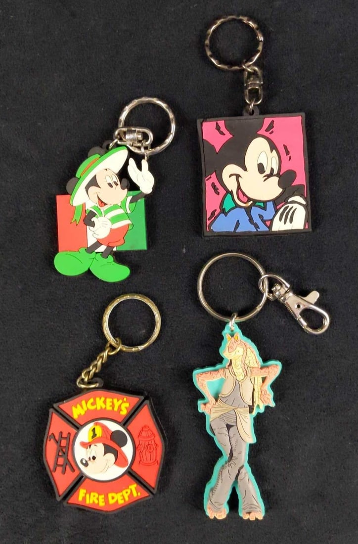 Four Disney Mickey Mouse Star Wars Keychains: This lot includes: (1) Mickey In Blue Keychain. Is approx 2" x 4". The keychain has a slight wearing on the face. (1) Disneyland Paris Mickey With Flag Of Italy. Is approx 2" x 5"