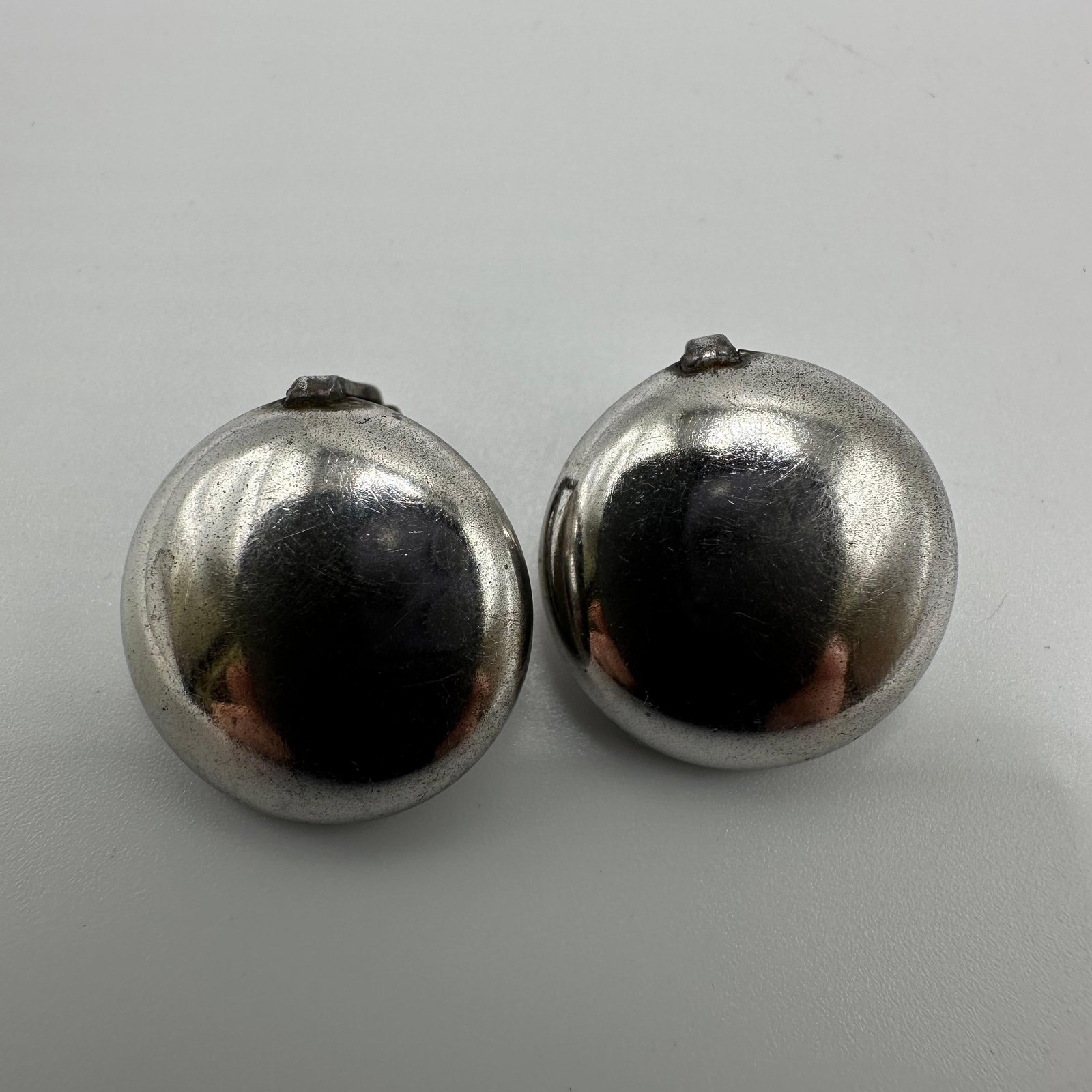 Sterling Silver Art Deco Style Puff Button Clip On Earrings: This item is in good pre-owned, previously used/displayed condition with noticeable light wear and surface scratches. Please reference all photos for full details. This piece of jewelry has been teste