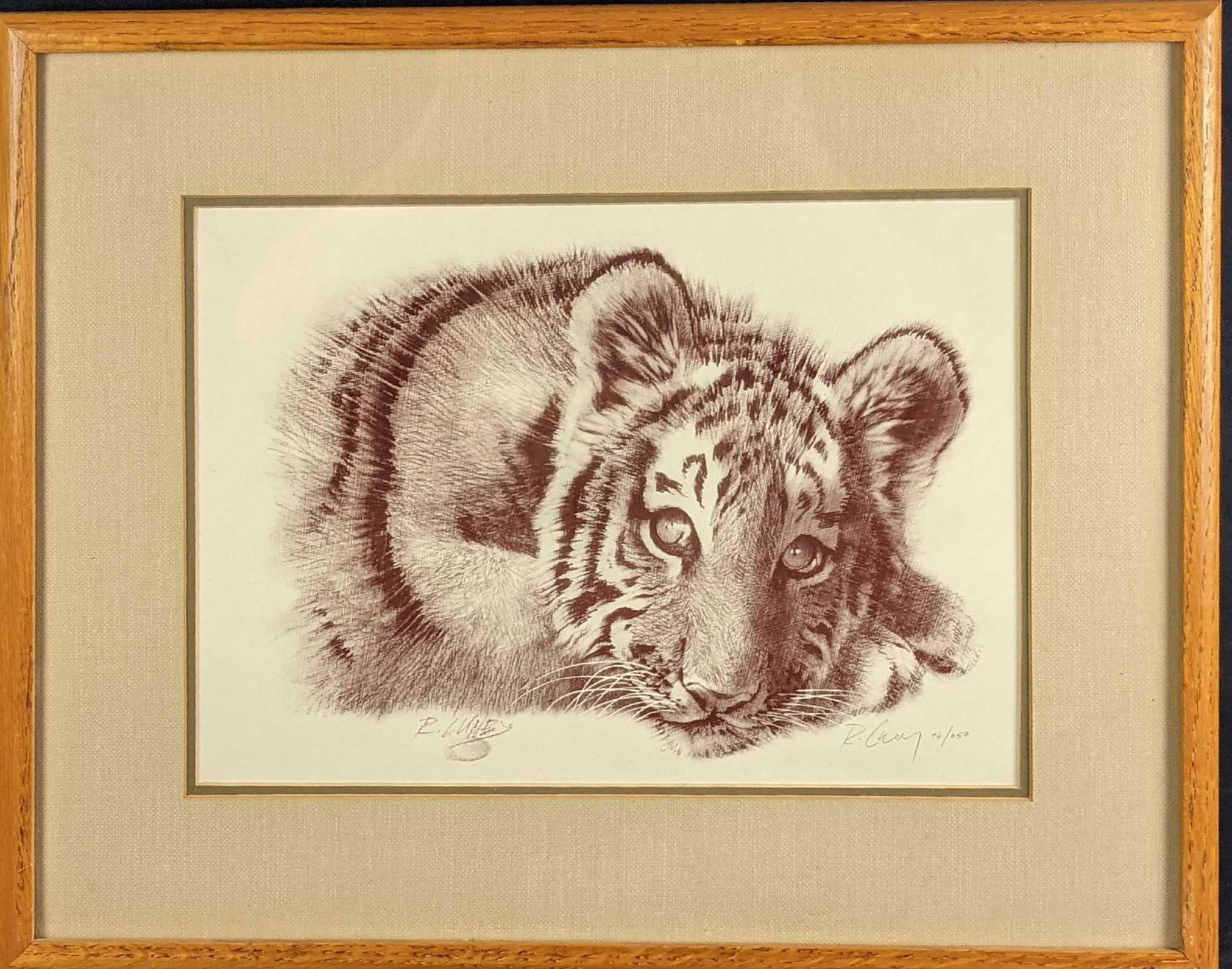 Framed LE Lithograph Print Tiger Cub: Limited edition lithograph of a tiger cub, by artist, Richard Luney. Is #96 out of #350. Signed and numbered by the artist on the bottom right of the print. The framed print is approx 20 3/4" x 1 1/2"