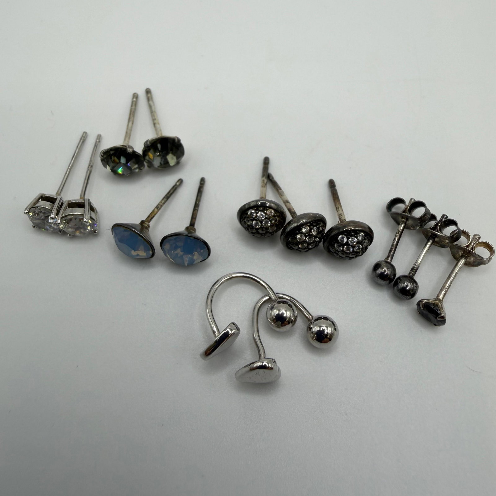 Group of Sterling Silver 925 Gemstone CZ Stud Earrings: These items are in good pre-owned, previously used/displayed condition with noticeable light wear and surface scratches. Please reference all photos for full details. These pieces of jewelry have been