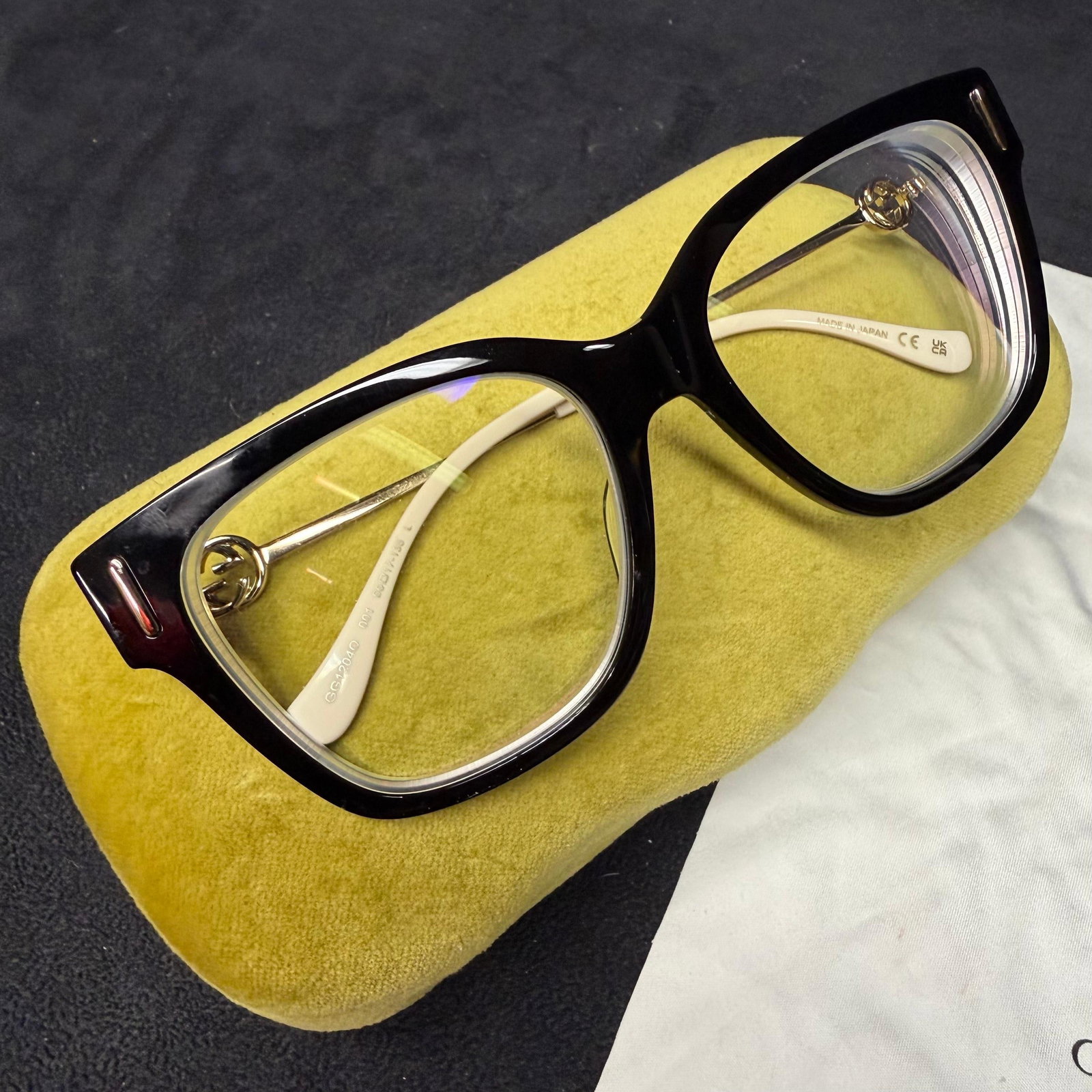 Gucci GG 1204O 001 55mm Eyewear Frames Glasses RX Optical Eyeglasses: Authentic Gucci model GG1204O 001 eyeglass frames featuring a glossy black front with white temple tips and signature interlocking GG logo hinges. Marked 55 17-135, Made in Japan. Includes the origina