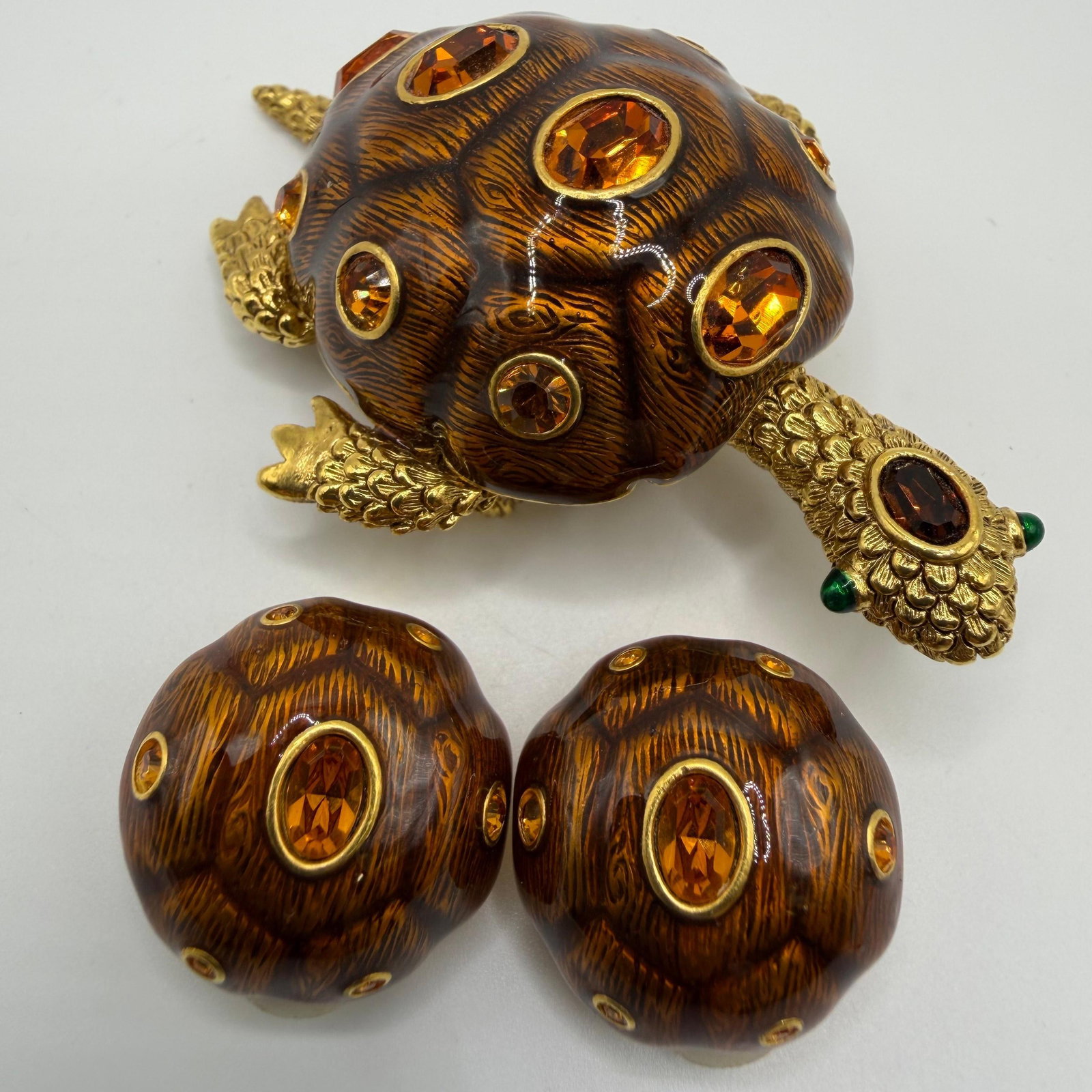 Joan Rivers Classics Turtle Brooch and Matching Clip-On Earrings Set Amber Brown Tone: Joan Rivers Classics jewelry set featuring a large turtle brooch with a sculpted faux tortoise shell enamel body accented by amber-colored faceted rhinestones and gold-tone textured head, legs, and ta