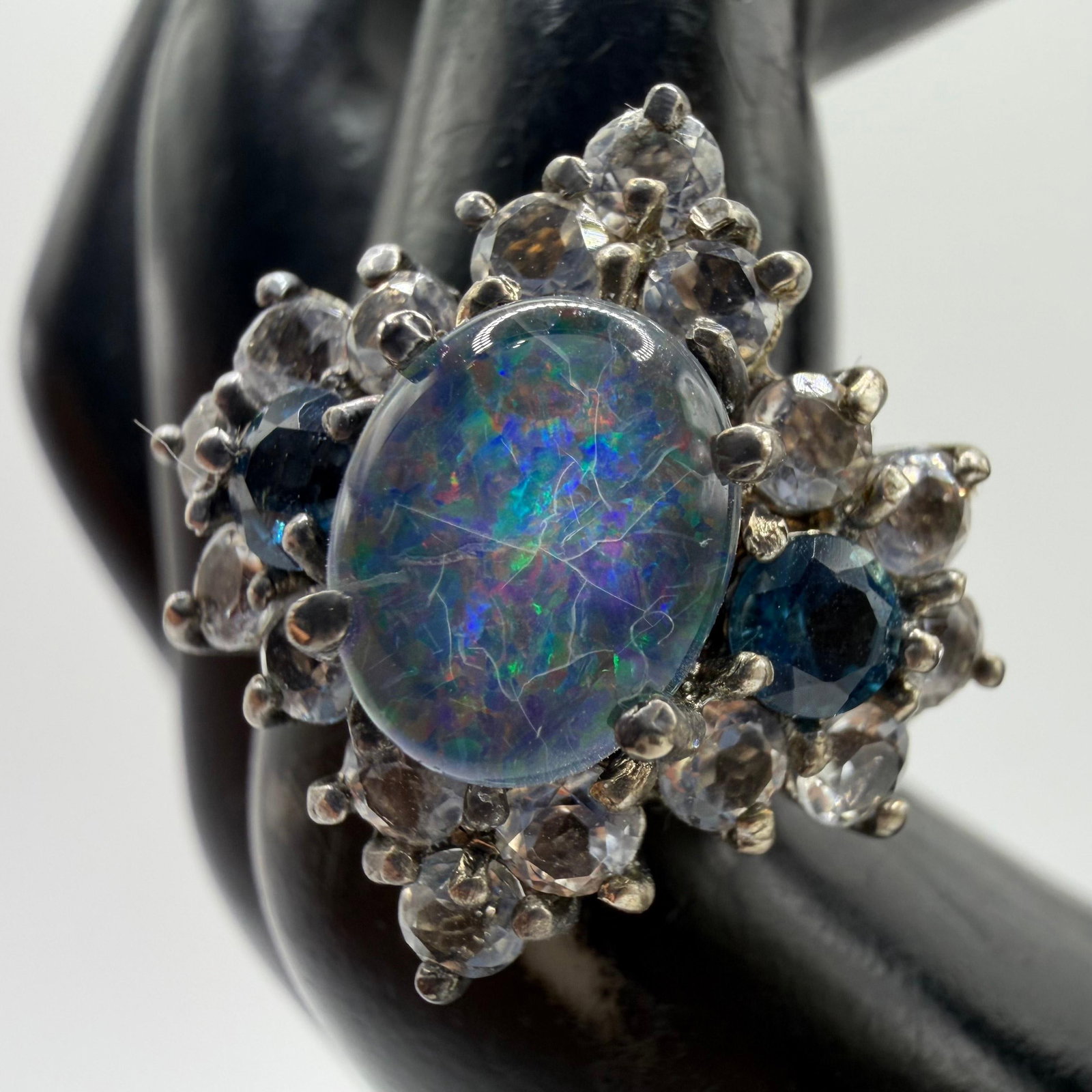 Doublet Opal Blue and White Sapphires Sterling Silver Ring: This item is in pre-owned, previously used/displayed condition with noticeable light wear and surface scratches. Please reference all photos for full details. This piece of jewelry has been tested and