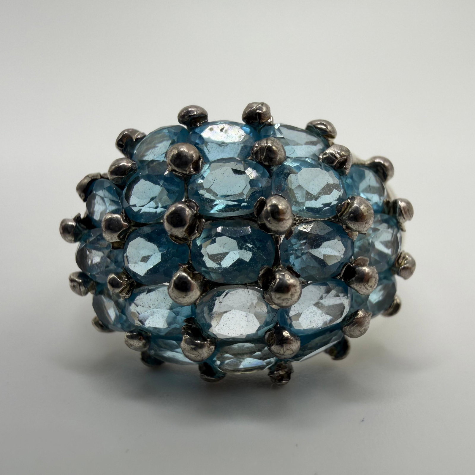 Domed Cluster Design Blue Topaz Sterling Ring Thai 925 Sz 10: This item is in pre-owned, previously used/displayed condition with noticeable light wear and surface scratches. Please reference all photos for full details. This piece of jewelry has been tested