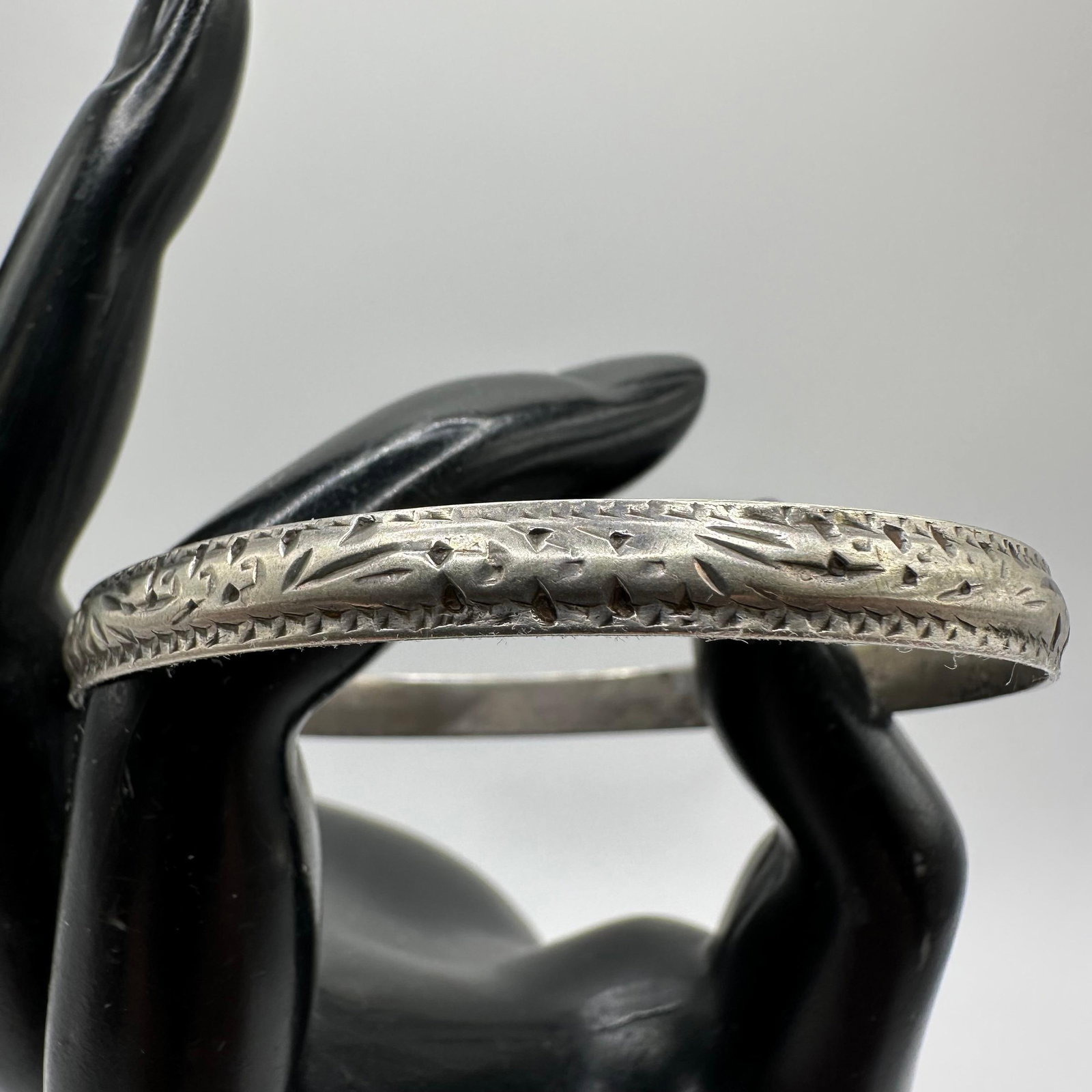 Etched Intricate Floral Foliate Silver Bangle Bracelet M47: This item is in good pre-owned, previously used/displayed condition with noticeable light wear and surface scratches. Please reference all photos for full details. This piece of jewelry has been teste