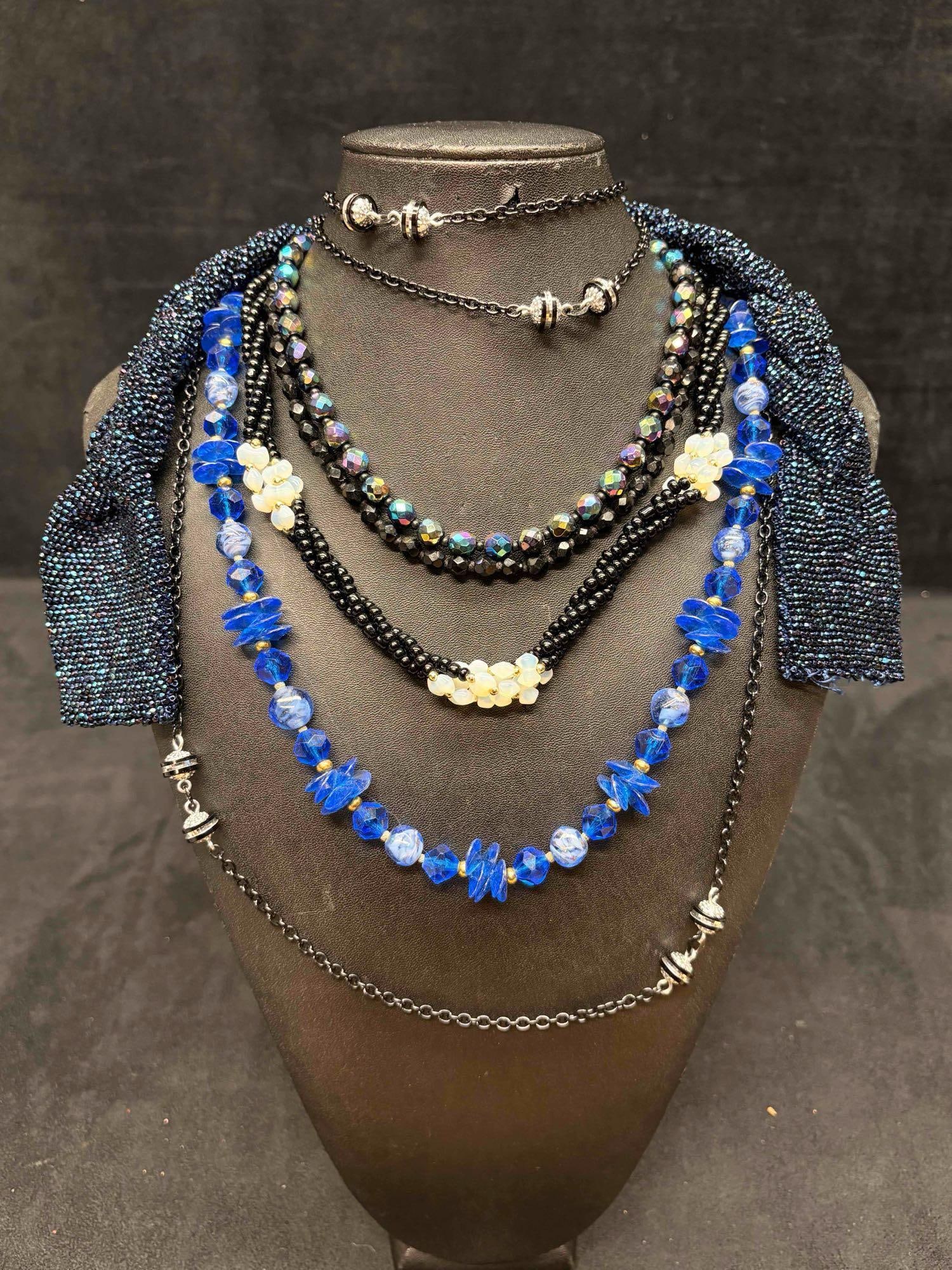 6pc Blue Black and Silver Galactic Necklace Lot: This lot consists of 6 pre-owned costume jewelry necklaces with typical wear from use. Please review images for context of the lots visual conditions. APPROX. WEIGHT: 9.7 OZ