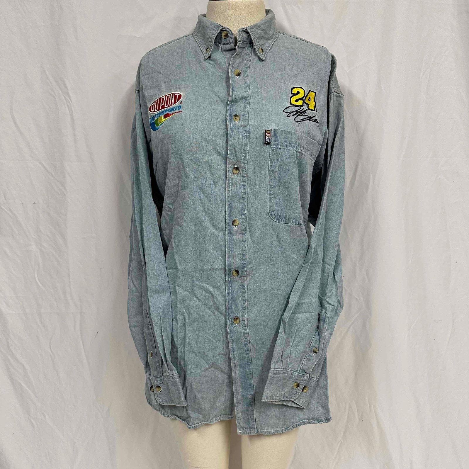 NASCAR Jeff Gordon #24 Vintage Denim T-Shirt Winner's Circle Shirt: NASCAR Jeff Gordon #24 Vintage Denim T-Shirt Winner's Circle Shirt. Light staining and discoloring due to storage. Size Medium. This item is in like new, previously displayed condition with light