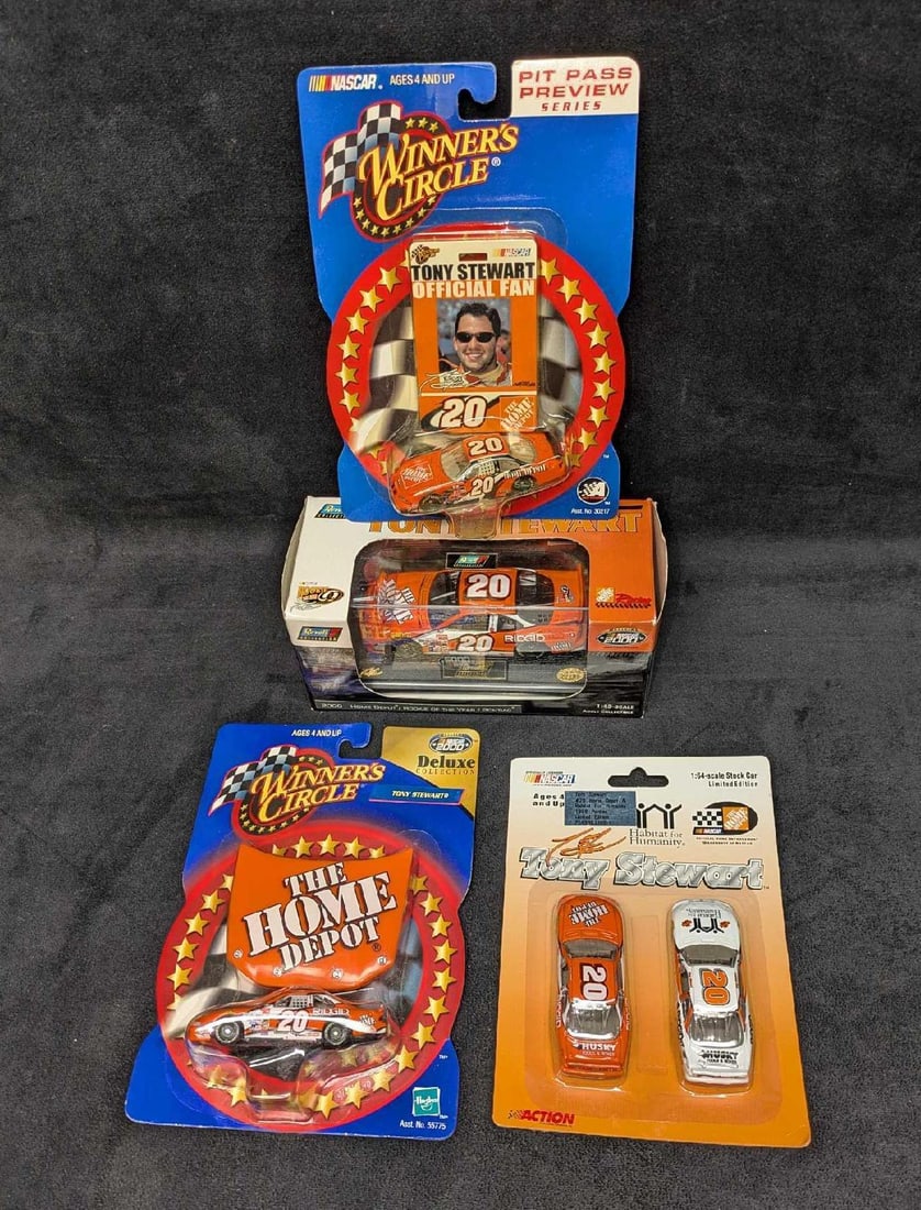 4 Tony Stewart NASCAR Boxed Die Cast Cars: 4 Tony Stewart NASCAR Boxed Die Cast Cars. This lot includes: (1) Revell Collection - Nascar 2000 Home Depot Rookie Of The Year/Pontiac Tony Stewart Die Cast 1:43 Scale Car. This comes in the original