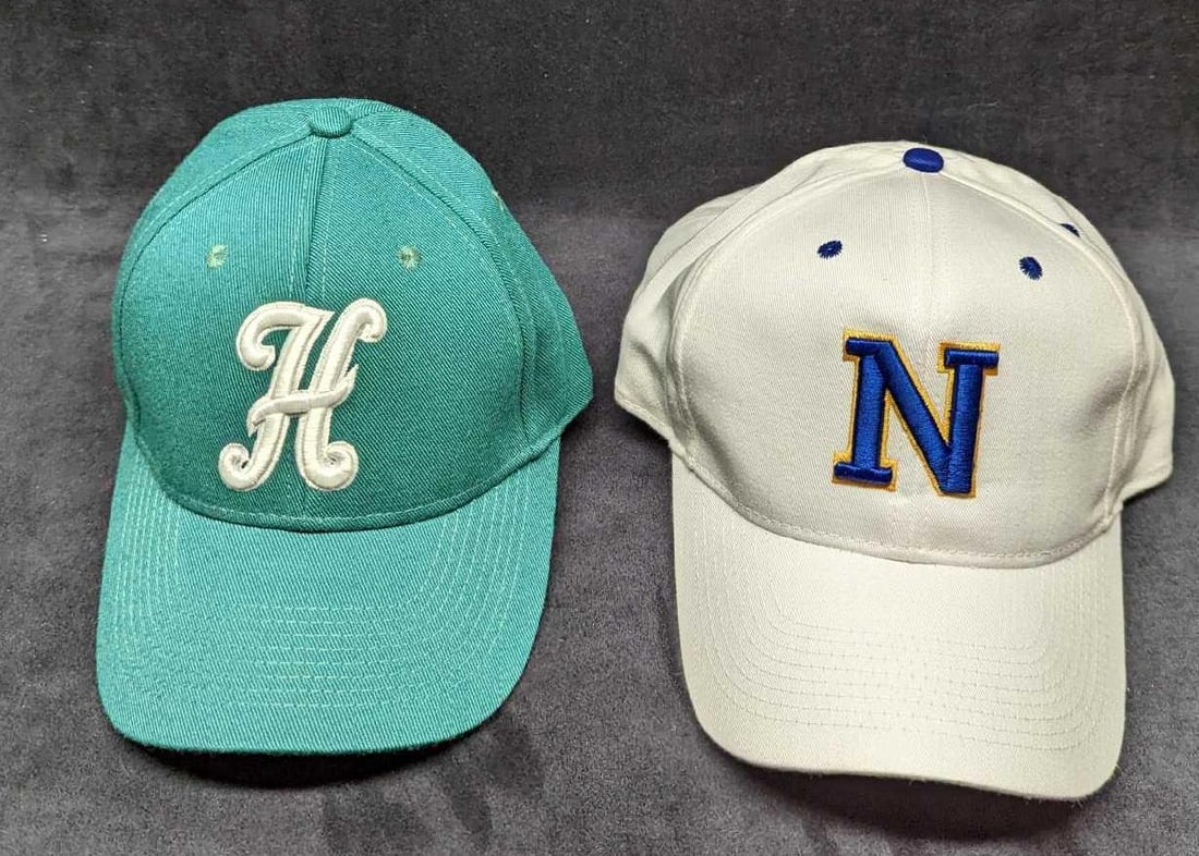 2 Rangers & Huskies Baseball Caps: 2 Rangers & Huskies Baseball Caps. This lot includes: (1) Huskies Cap By Milwaukee Sporting Goods. Size Medium. This is approx 7" x 9" x 5". (1) Rangers Cap By Calhead. Size Medium/Lar
