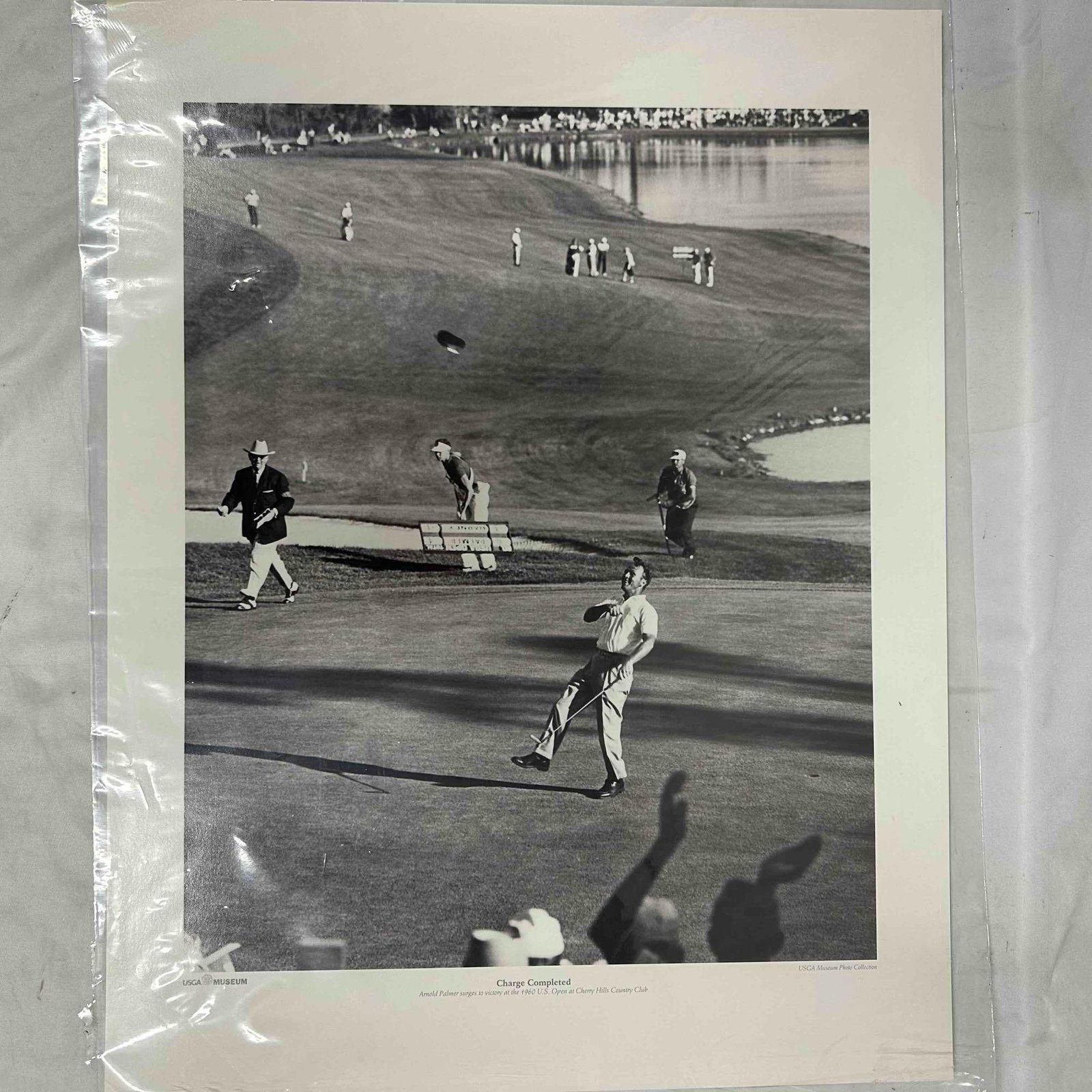 USGA Museum Arnold Palmer Charge Completed 1960 U.S. Open Golf Print: Black-and-white photograph print titled Charge Completed showing Arnold Palmer surging to victory at the 1960 U.S. Open at Cherry Hills Country Club. Official USGA Museum print from the USGA Museum Ph