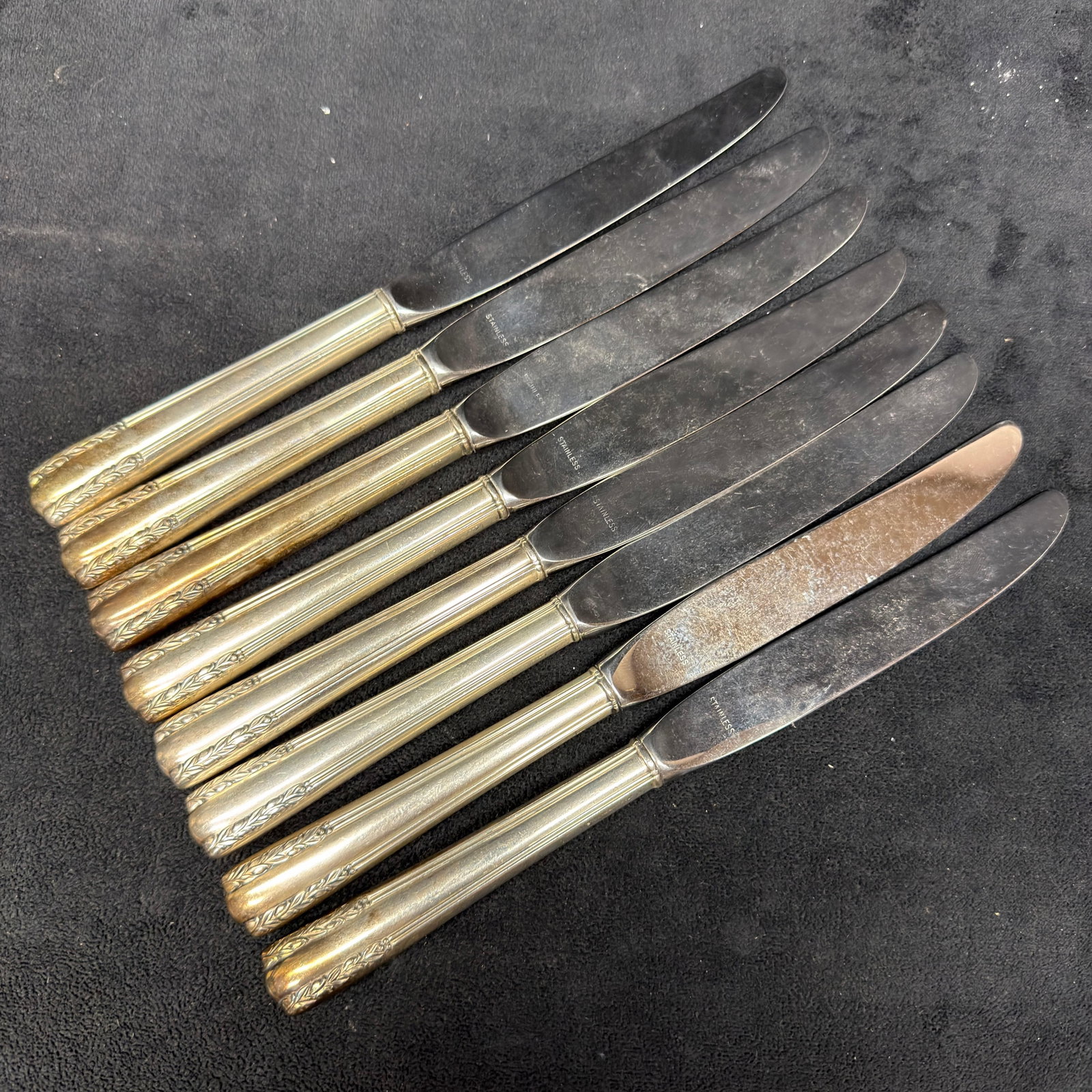 Sterling Handle Stainless Steel Blade Butterknives Set of Eight: These items are in good pre-owned, previously used/displayed condition with noticeable light wear and surface scratches. Please reference all photos for full details. These pieces of silverware have