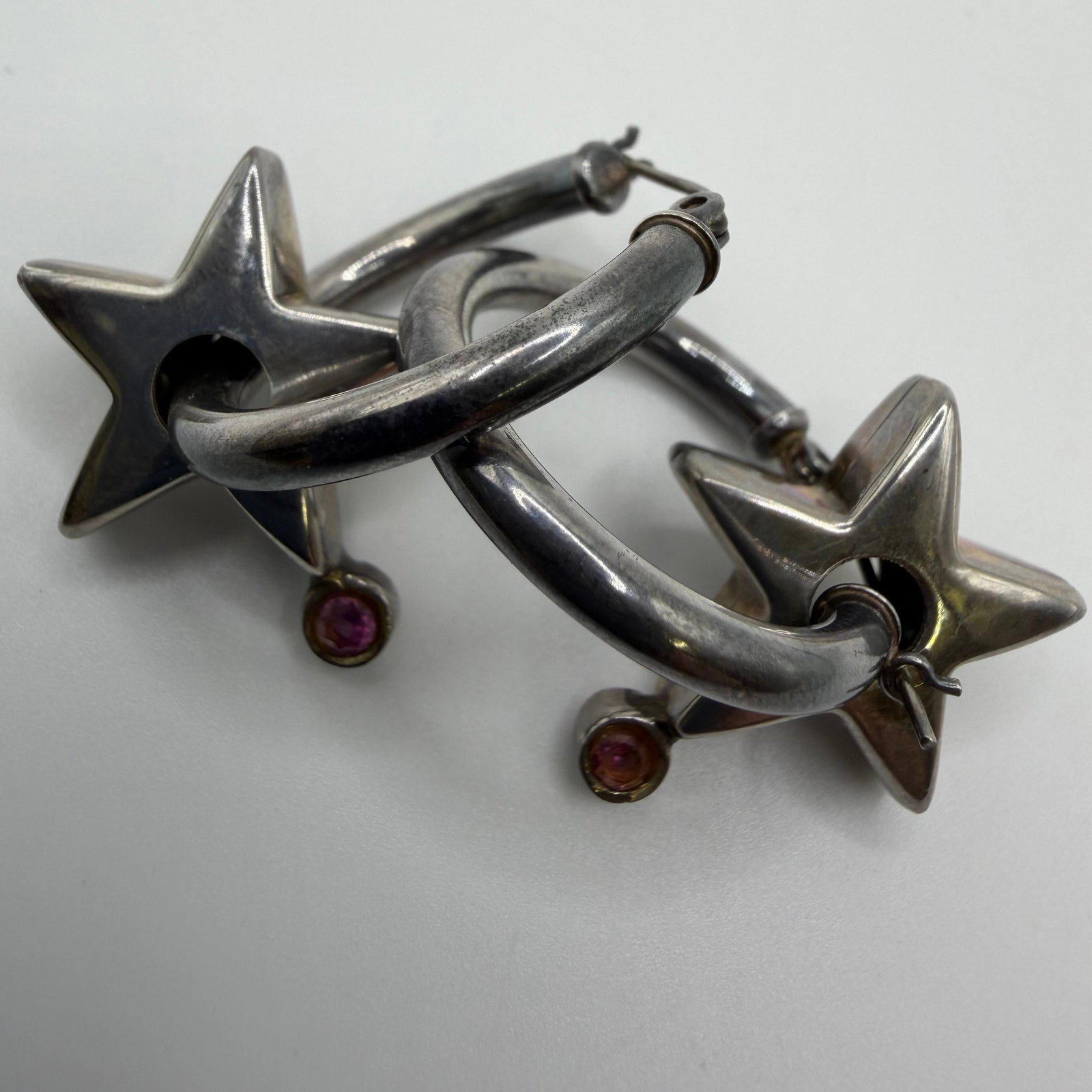 Silver Hoop Earrings with Star Pink Rhinestone HH21: This item is in good pre-owned, previously used/displayed condition with noticeable light wear and surface scratches. Please reference all photos for full details. This piece of jewelry has been