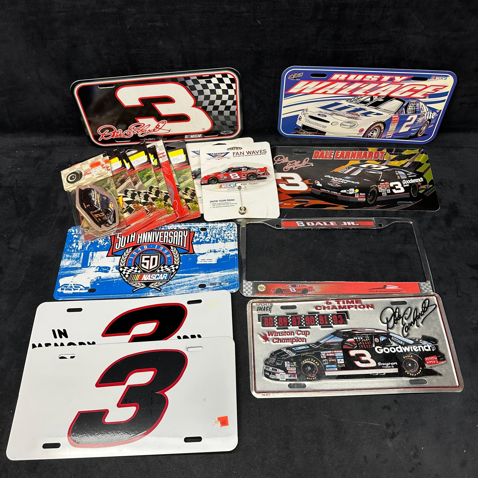 NASCAR License Plate and Fan Memorabilia Lot Dale Earnhardt Rusty Wallace: Group lot of NASCAR memorabilia, including multiple decorative license plates and fan items. Features Dale Earnhardt #3 plates, including Winston Cup Champion design and signature style examples,