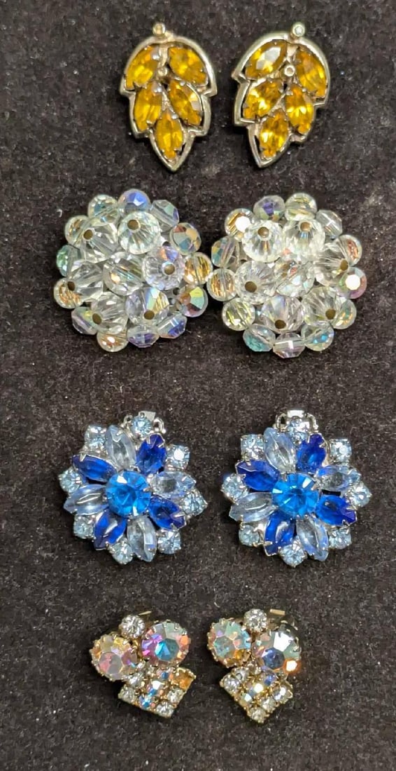Vintage Gold Silver Tone Unmarked And Barclay Clip On Earrings: Vintage Gold Silver Tone Unmarked And Barclay Clip On Earrings. This lot includes: (1) Set Of Barclay Silver Tone Rhinestone Clip On Earrings. Each is approx 1 1/4" x 3/4" x 1/2". (1) Set