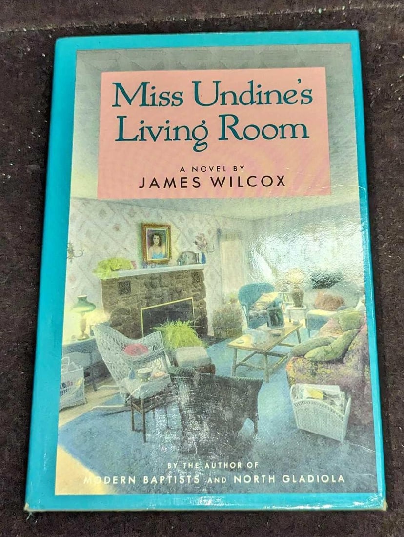 Autographed James Wilcox Miss Undine's Living Room HC: Autographed James Wilcox Miss Undine's Living Room HC. This was published by Harper & Row, Publishers (New York) and was copyrighted in 1987. The hardcover book is approx 5 3/4" x 1" x 8 1/2" and it w