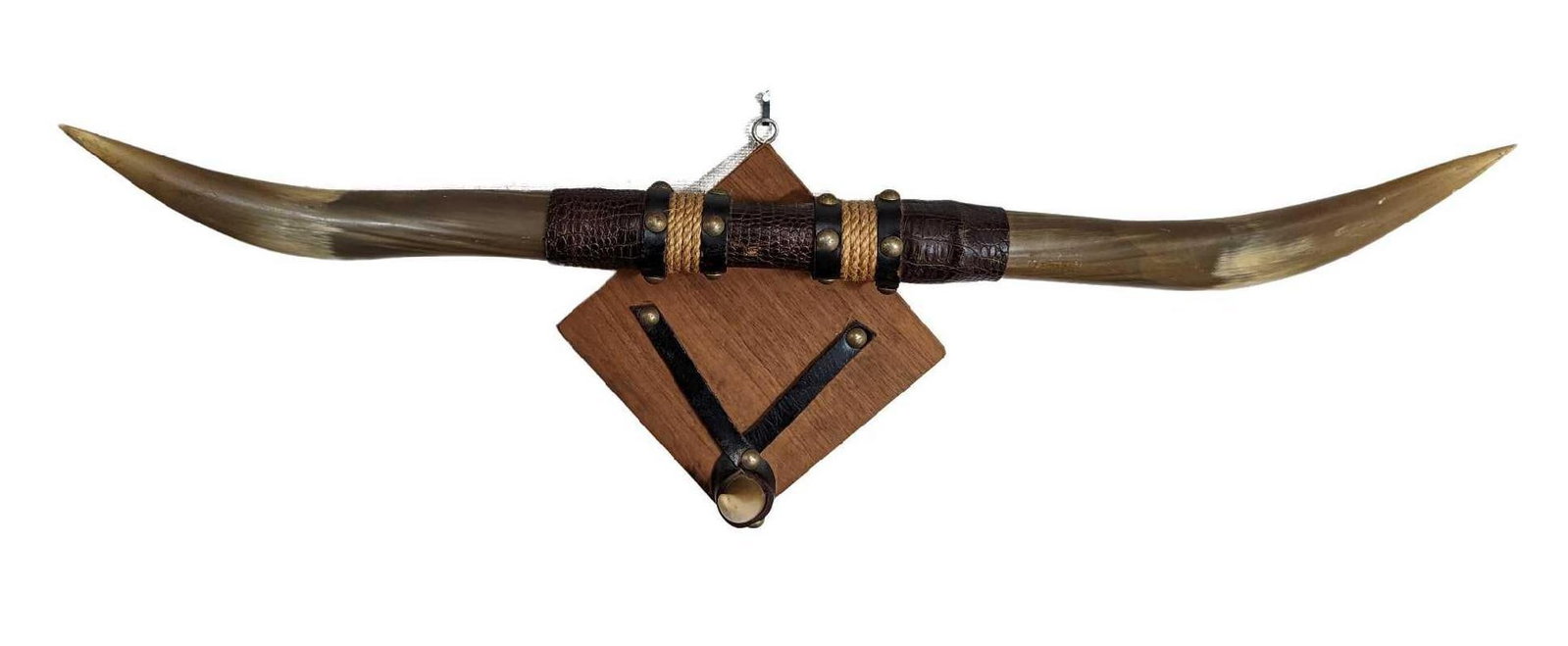Bull Horn Wall Mount Coat Hanger: Bull Horn Wall Mount Coat Hanger. Made of real bull horns, wood, and leather. The maker and date of creation are unknown. Is approx 25" x 6" x 9" and it weighs 2.14lbs. The hanger is in good, used con